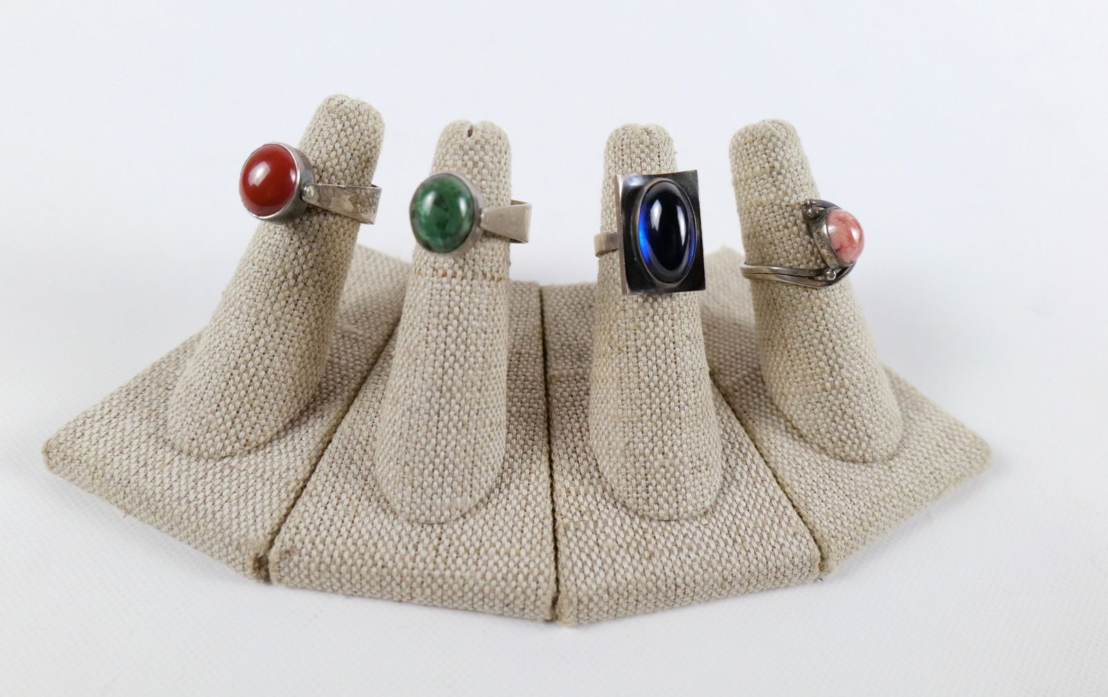 Lot of Modernist Sterling Silver Rings: Lot of Modernist Sterling Silver Rings. Including Two with stones that flip - Red Jasper/Tiger's Eye and Carnelian/Green Jasper, Sterling and Blue Cabochon Stone, and Sterling and Rhodochrosite. Rings