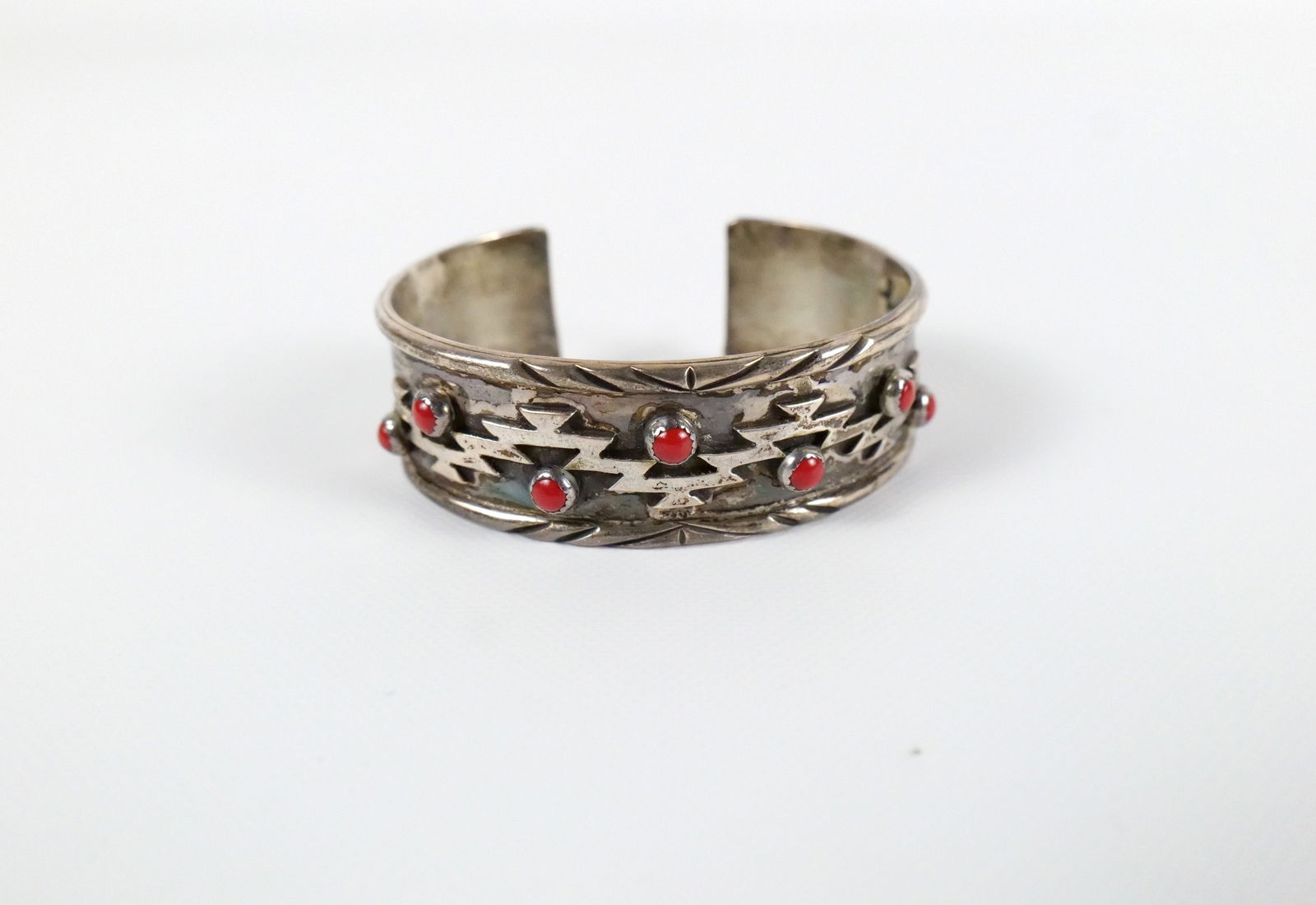 Sterling Silver Zouni Begay Cuff Bracelet: Sterling Silver Zouni Begay Cuff Bracelet with Cabochon Red Stones. Inside measures approx. 5.75". All invoices must be paid within 24 hours of the sale. We offer multiple shipping options, please rea