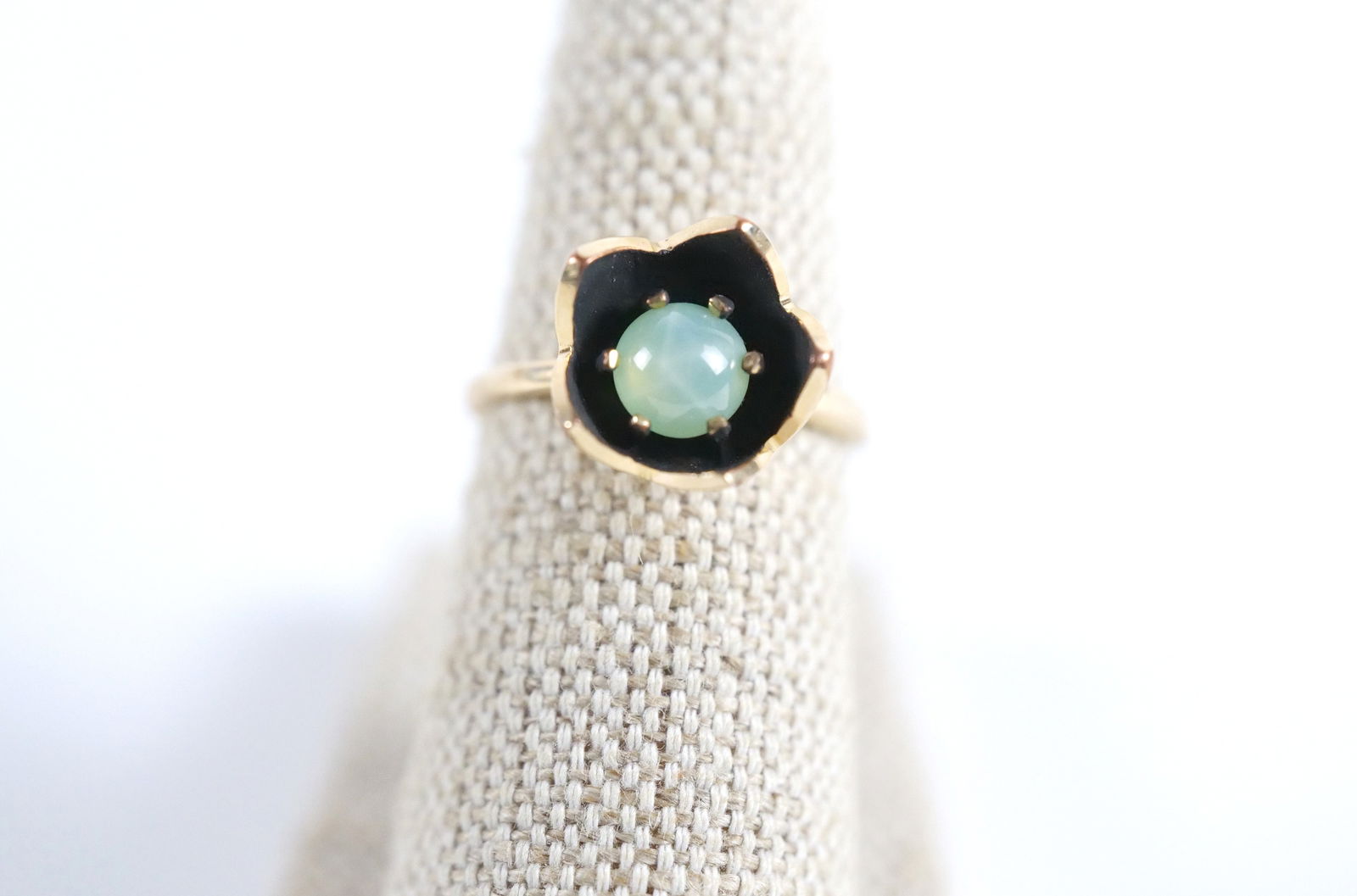 14k Floral Ring: 14k Floral Ring. Set with Cabochon Center Stone. Size 6 1/4. All invoices must be paid within 24 hours of the sale. We offer multiple shipping options, please read the shipping terms to understand you