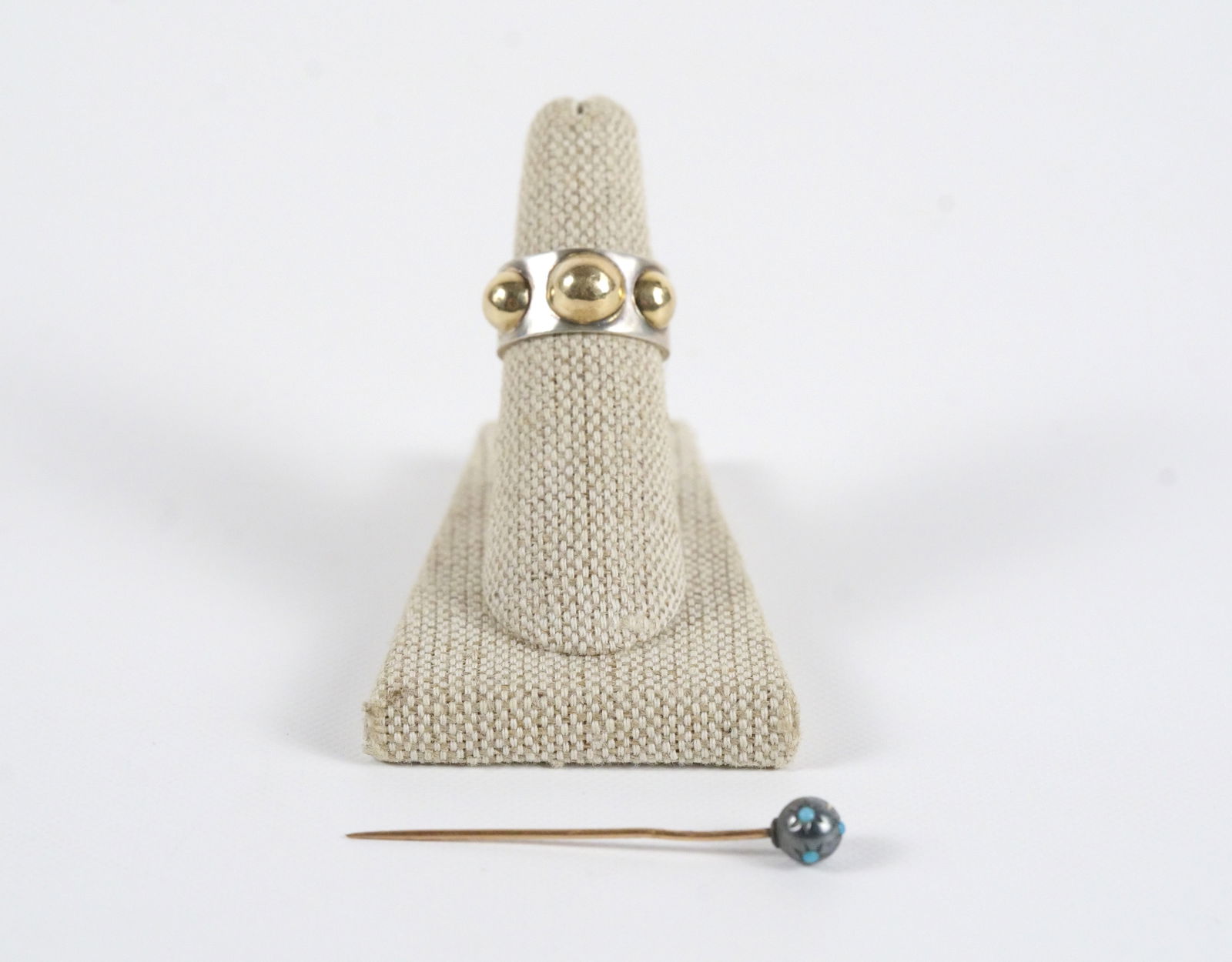 Lot of 14k and Sterling Jewelry: Lot of 14k and Sterling Jewelry. Including Sterling Silver and 14k Ring - Size 6 1/2 and 14k Stick Pin with Turquoise Stones. All invoices must be paid within 24 hours of the sale. We offer multiple s