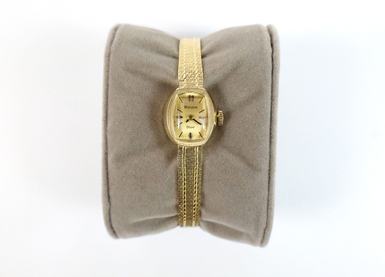 14k Bulova Christian Dior Woman's Watch: 14k Bulova Christian Dior Woman's Watch - Yellow Gold. The band is also 14k. Measures 6 1/4". All invoices must be paid within 24 hours of the sale. We offer multiple shipping options, please read the