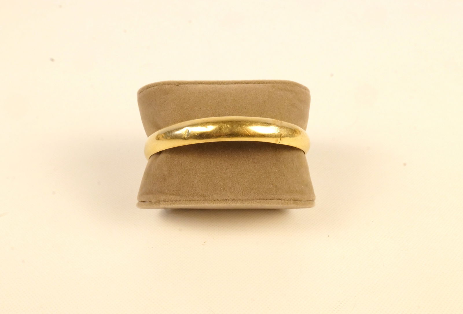 14k Hinged Bangle Bracelet: 14k Hinged Bangle Bracelet. Weighs approx. 12.6 grams. Latch doesn't stay closed and dented. Monogrammed on inside. All invoices must be paid within 24 hours of the sale. We offer multiple shipping op