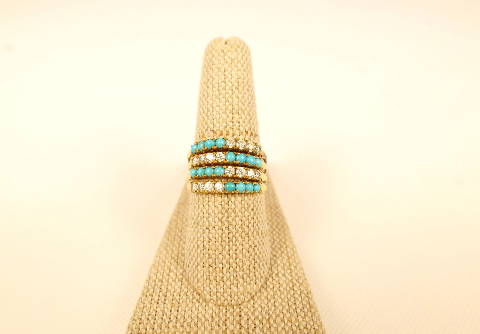 22k Ring with Turquoise Colored Stones and White Stones: 22k Ring with Turquoise Colored Stones and White Stones. Possibly 24k. Ring size 8.5. All invoices must be paid within 24 hours of the sale. We offer multiple shipping options, please read the shippin