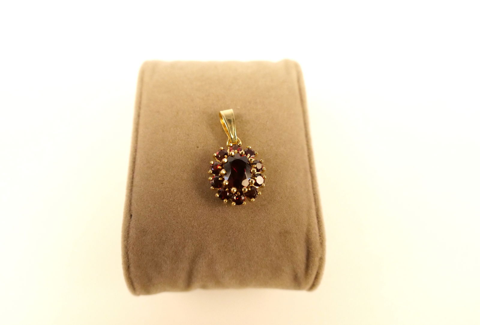14k and Garnet Pendant: 14k and Garnet Pendant. Measures 1". All invoices must be paid within 24 hours of the sale. We offer multiple shipping options, please read the shipping terms to understand your options. We also