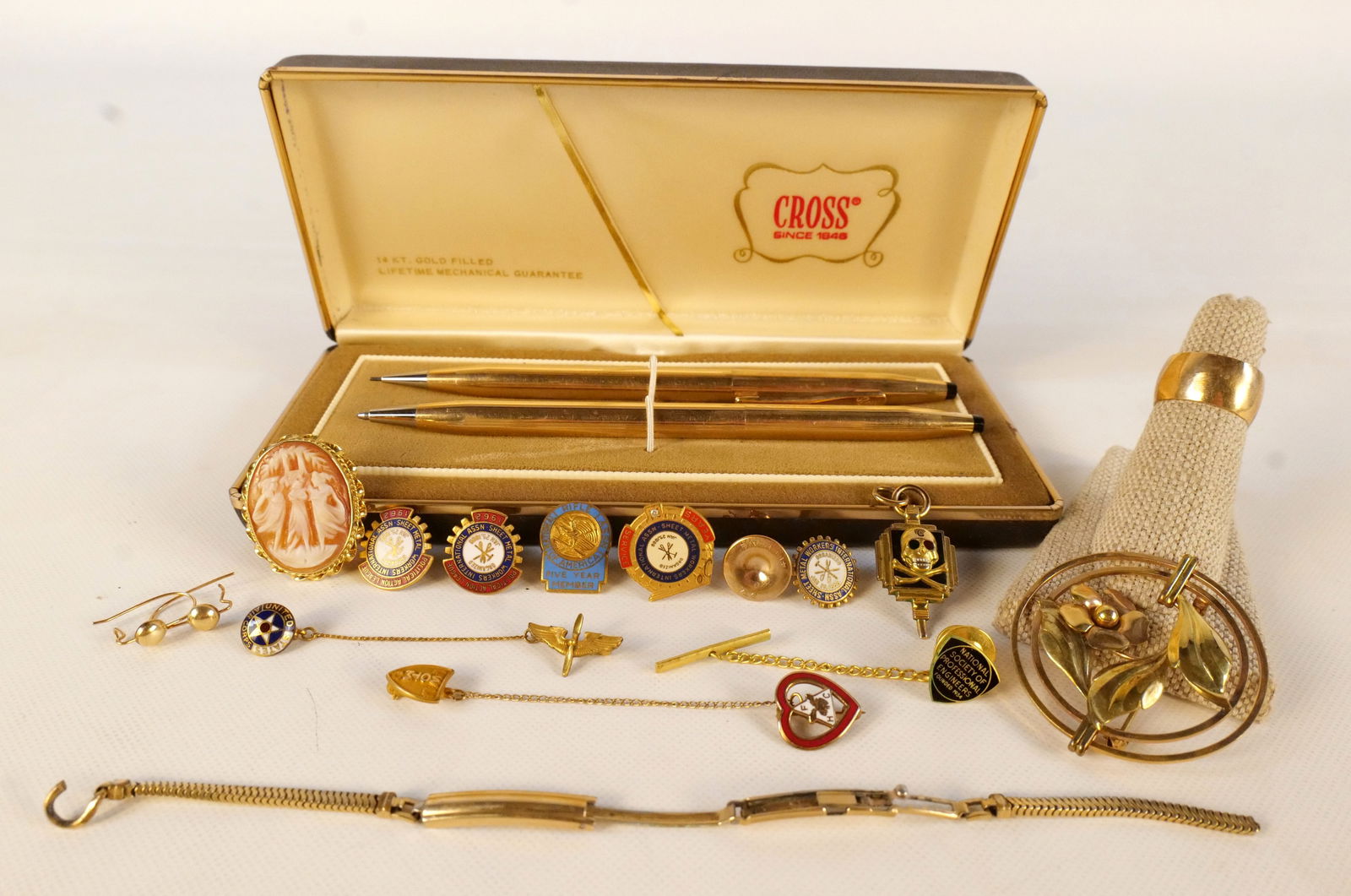 Lot of Gold Filled Jewelry: Lot of Gold Filled Jewelry. Including 10k, 12k, and 14k. Including Cross 14k Gold Filled Pen and Pencil Set, 10k Gold Filled Fraternal Skull and Crossbone Pendants, 14k Gold Filled Pendant and Other A