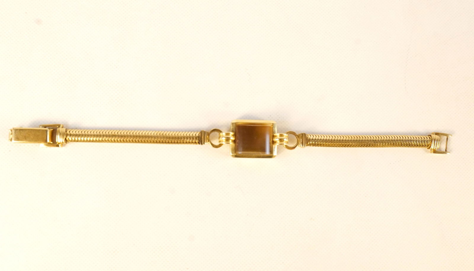 14k Watch Case and Band: 14k Watch Case and Band. Engraved on back. Weight is 21.3 grams. All invoices must be paid within 24 hours of the sale. We offer multiple shipping options, please read the shipping terms to understand