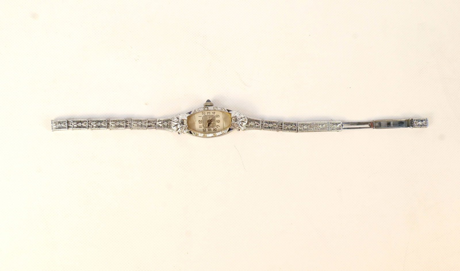 18k Diamond and Sapphire Ladies Art Deco Watch: 18k Diamond and Sapphire Ladies Art Deco Watch. Swiss. Only Watch Case is Gold. All invoices must be paid within 24 hours of the sale. We offer multiple shipping options, please read the shipping term