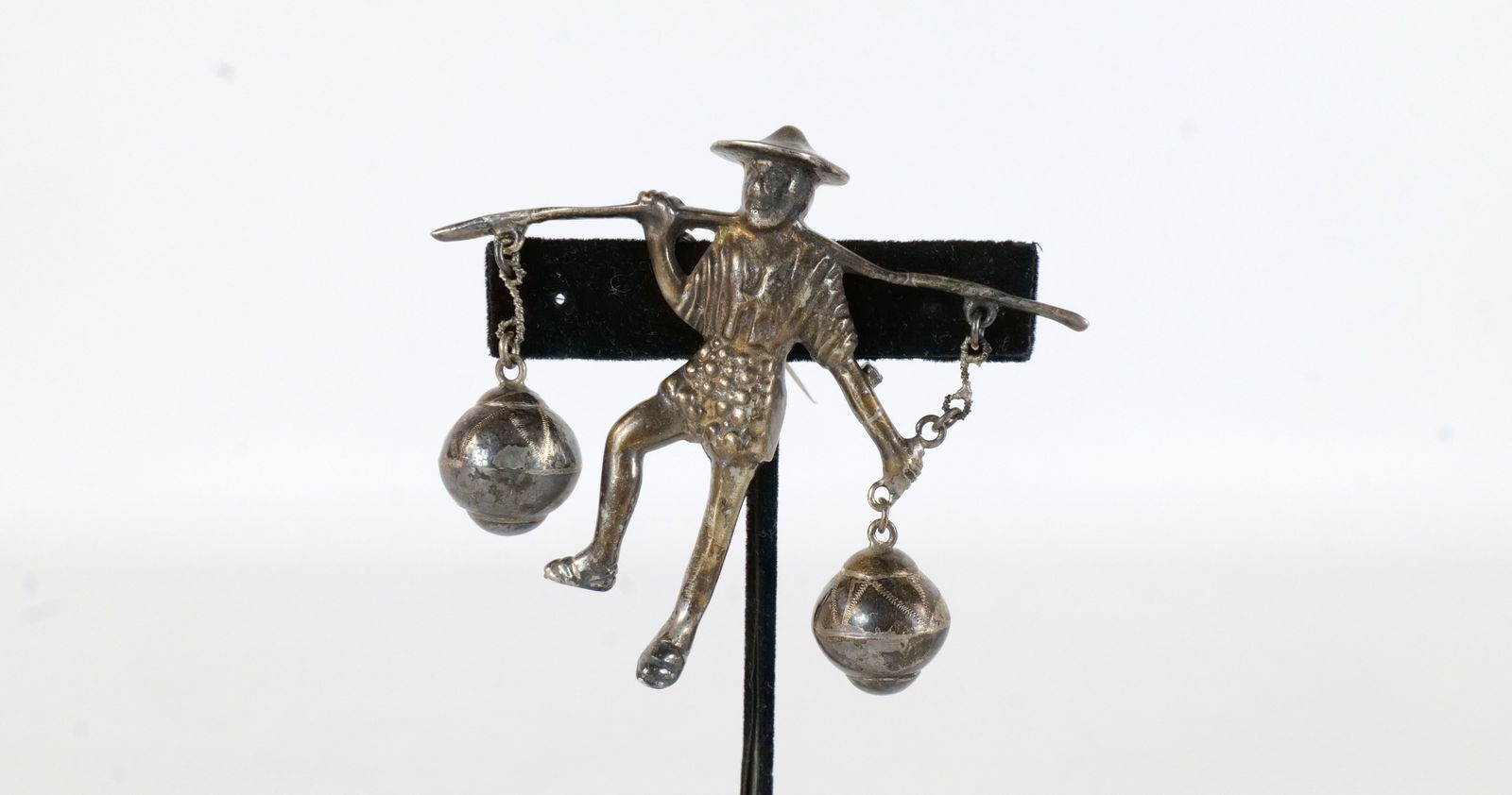 Silver Pin with Asian Man (1 of 3)