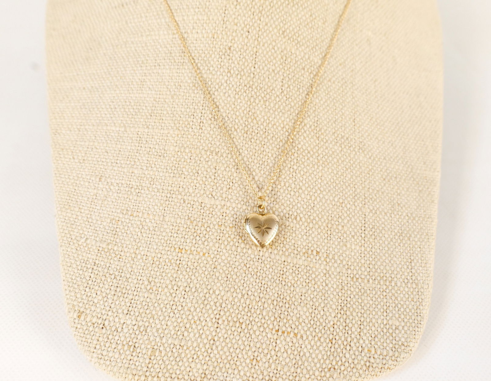 14k Yellow Gold Chain with Heart Locket: 14k Yellow Gold Chain with Heart Locket. Weighs 1.9 grams. Chain measures 16". All invoices must be paid within 24 hours of the sale. We offer multiple shipping options, please read the shipping terms