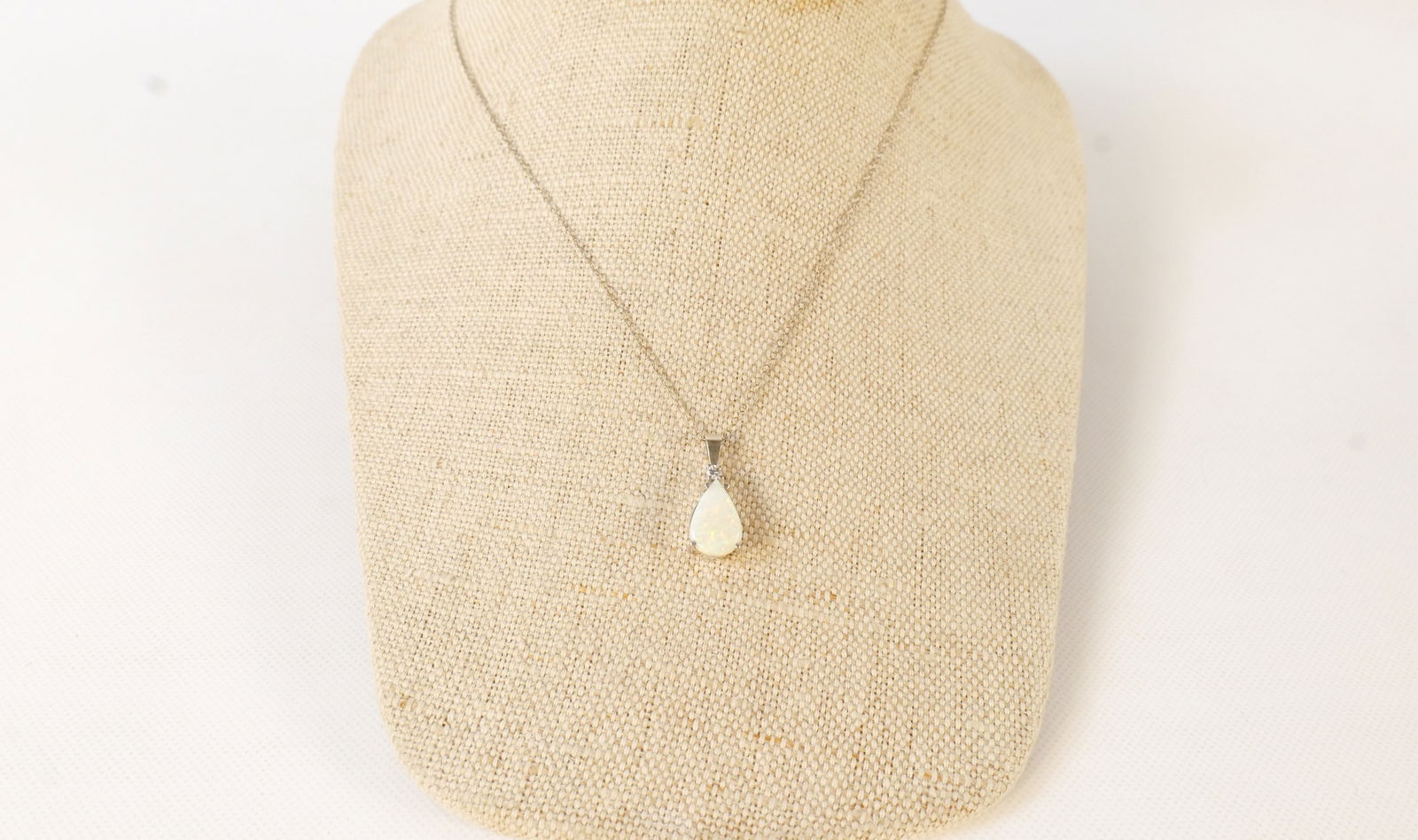 14k White Gold, Opal and Diamond Pendant Necklace: 14k White Gold, Opal and Diamond Pendant Necklace. Chain measures 18". All invoices must be paid within 24 hours of the sale. We offer multiple shipping options, please read the shipping terms to unde