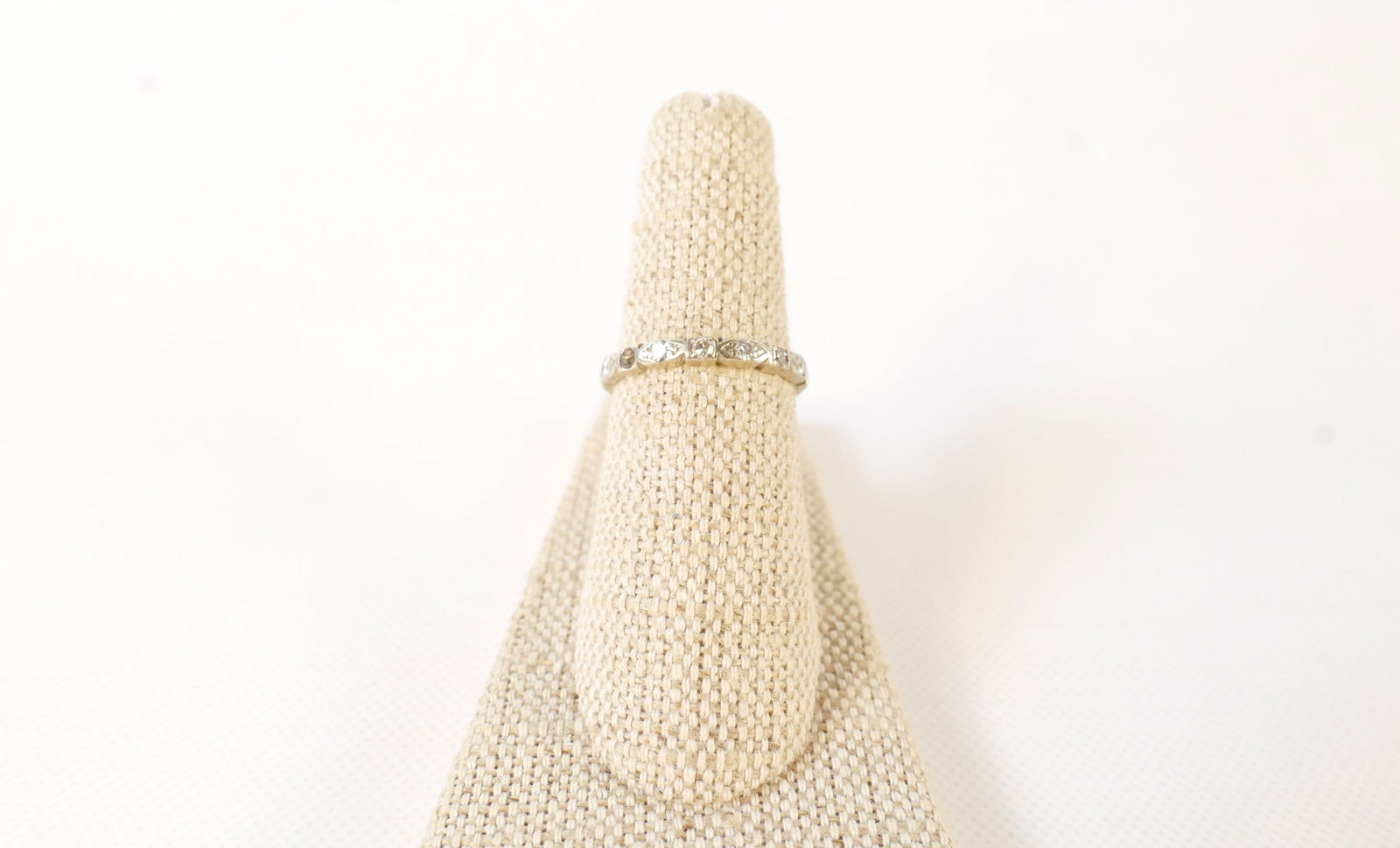 14k White Gold and Diamond Band: 14k White Gold and Diamond Band. Missing 2 stones. Size 6.75. All invoices must be paid within 24 hours of the sale. We offer multiple shipping options, please read the shipping terms to understand yo