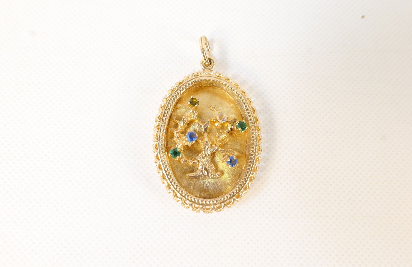 14k Yellow Gold Family Tree Pendant: 14k Yellow Gold Family Tree Pendant. Set with Semi-Precious Stones and Diamonds. All invoices must be paid within 24 hours of the sale. We offer multiple shipping options, please read the shipping ter