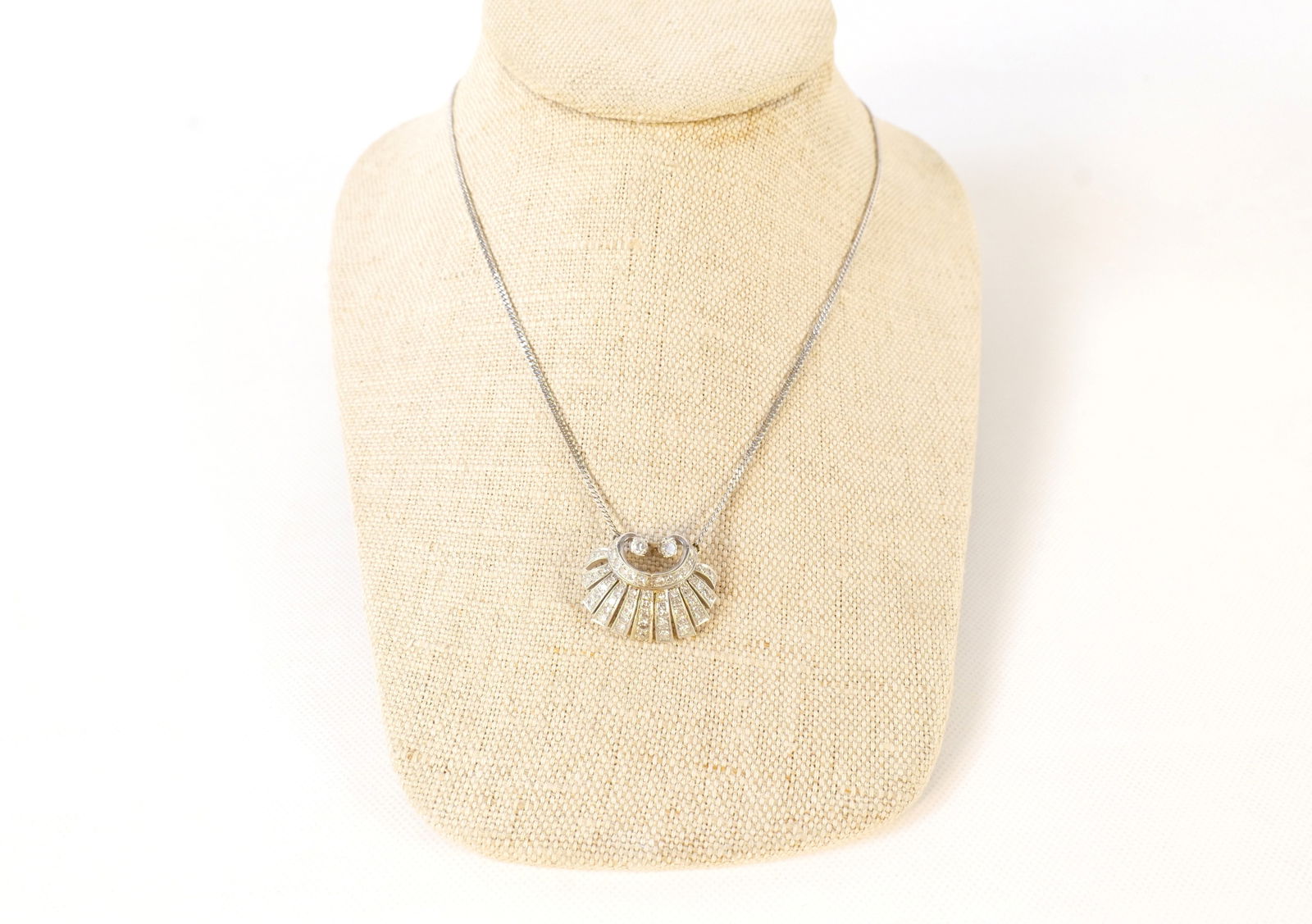 14k White Gold and Diamond Pendant Necklace: 14k White Gold and Diamond Pendant Necklace. Some discoloration. Measures 19" long. All invoices must be paid within 24 hours of the sale. We offer multiple shipping options, please read the shipping