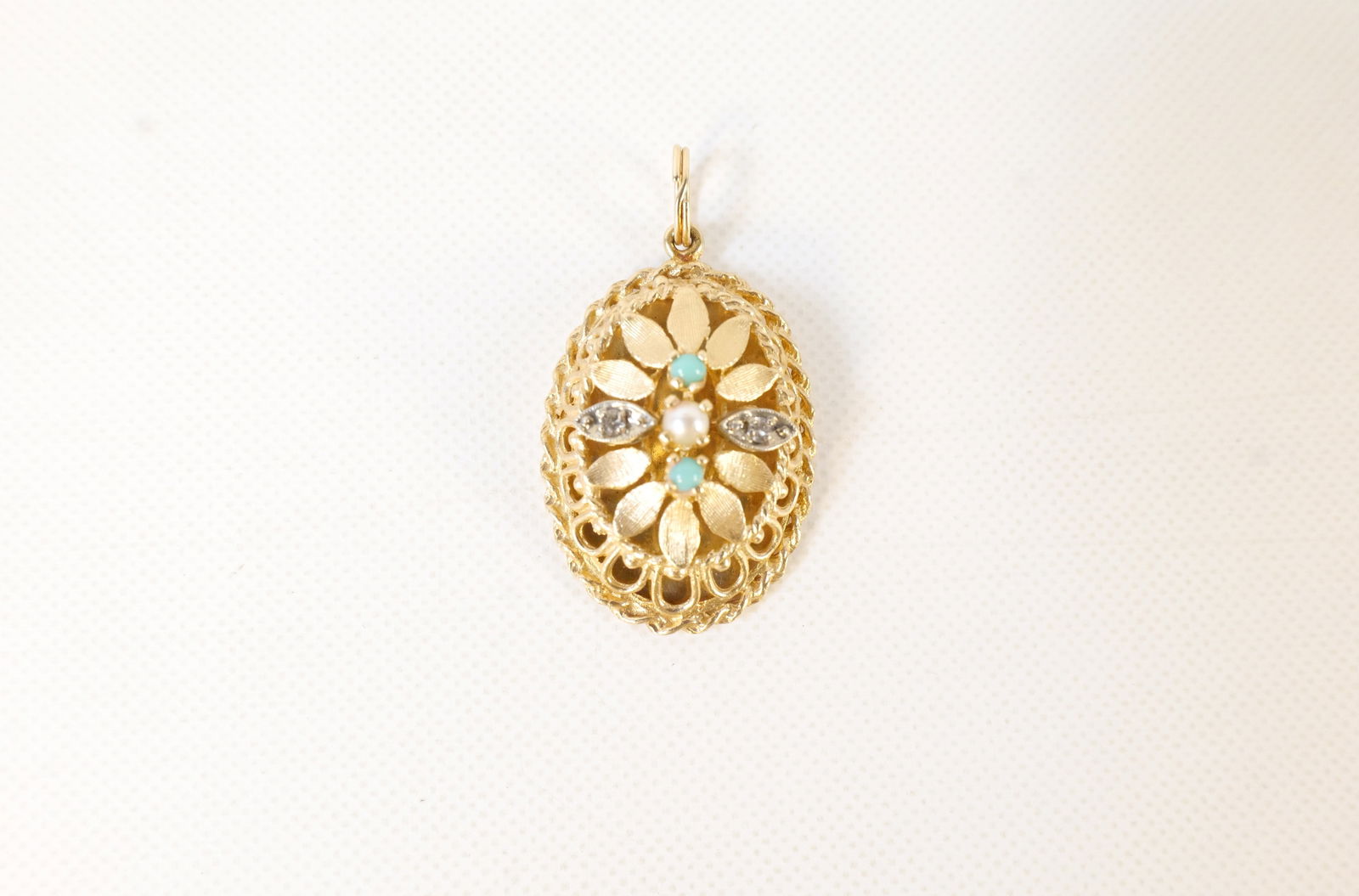 14k Yellow Gold Pendant Necklace: 14k Yellow Gold Pendant Necklace. Set with Turquoise, Diamonds, and Seed Pearl. All invoices must be paid within 24 hours of the sale. We offer multiple shipping options, please read the shipping term