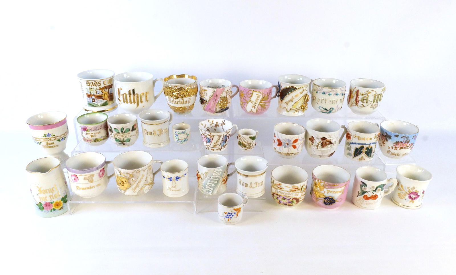 Lot of 25+ Souvenir Cups: Lot of 25+ Souvenir Cups. Also includes Pitcher and Tall Cup. Victorian Era - 1950's. Including Present, Father, Mama, Dad's Cup, Felicidad, Remember Me, Forget Me Not, and More. Tallest measures appr