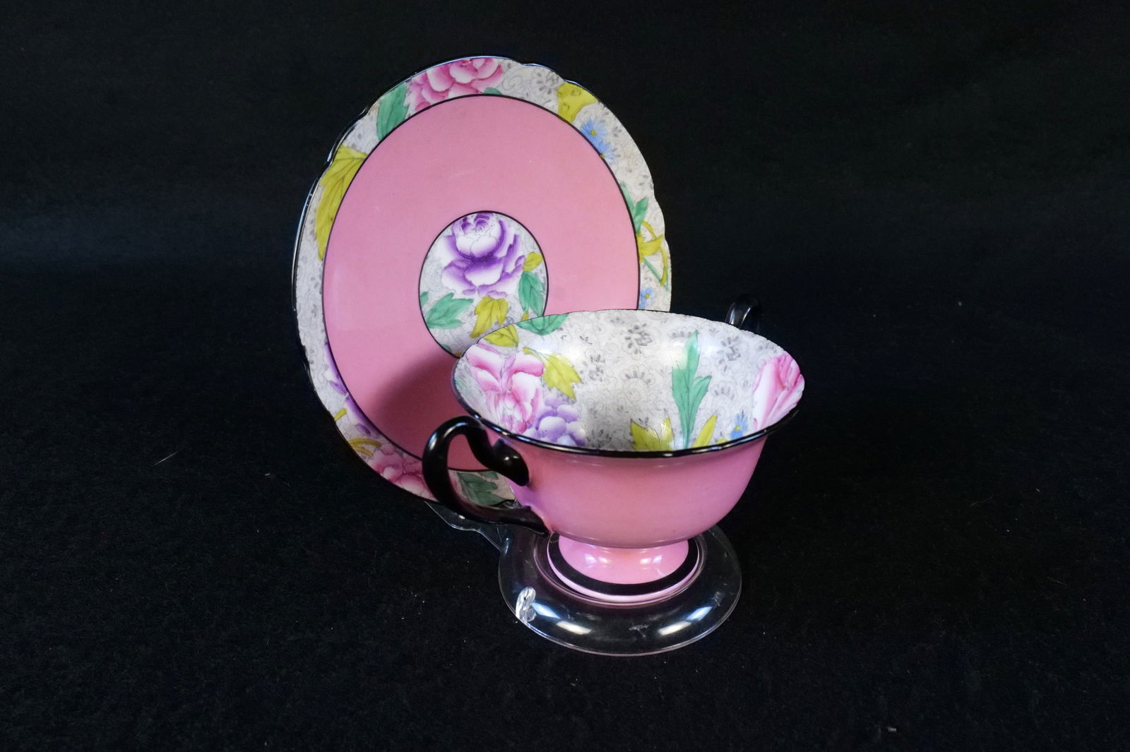 Shelley Bone China Gainsborough Pink Chintz Teacup and Saucer: Shelley Bone China Gainsborough Pink Chintz Teacup and Saucer. Double Handled with Black Accents. Good Condition. All invoices must be paid within 24 hours of the sale. We offer multiple shipping opti