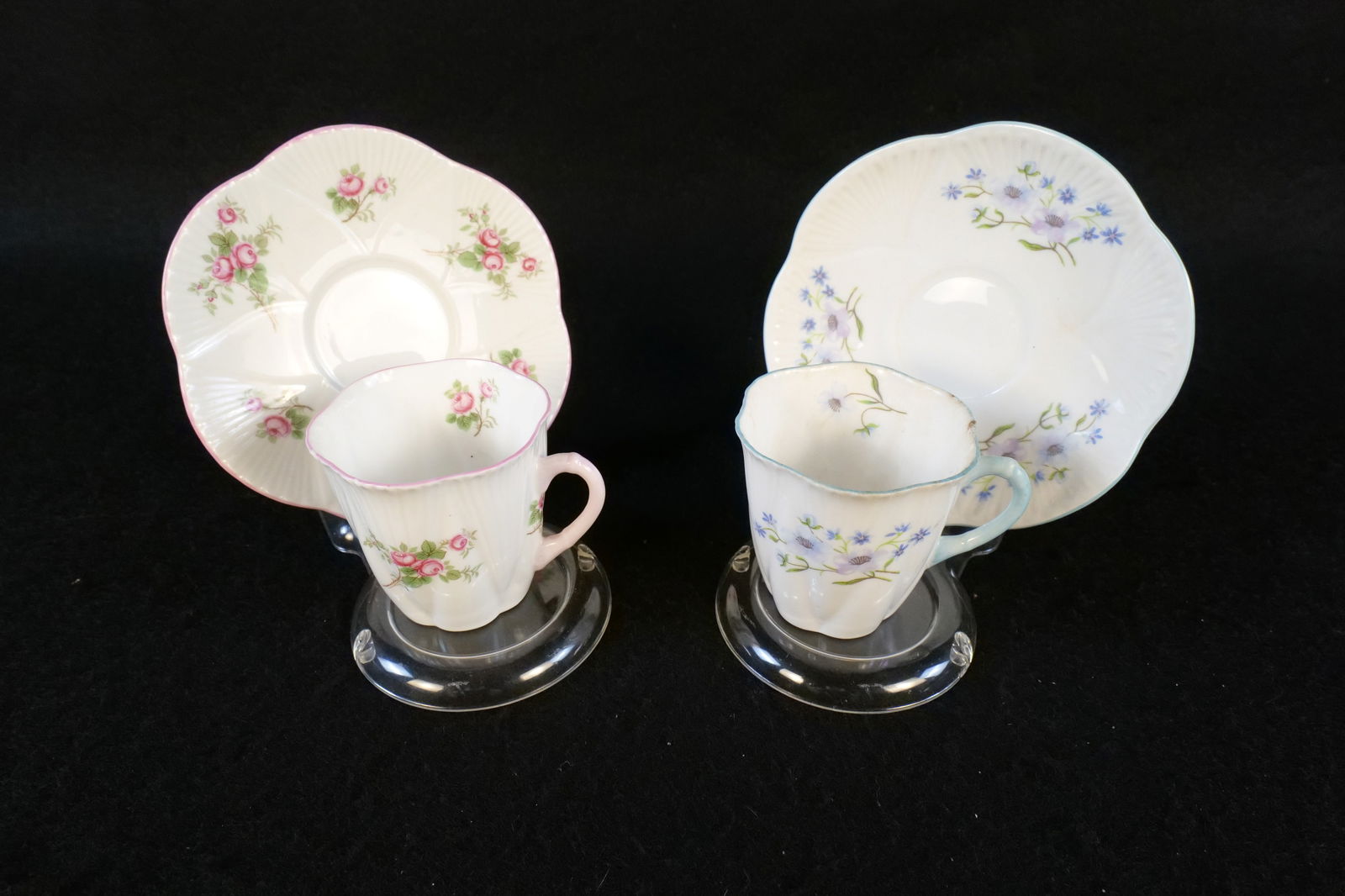 Lot of 2 Shelley Demitasse Bone China Demitasse Cups and Saucers: Lot of 2 Shelley Demitasse Bone China Demitasse Cups and Saucers. Including Blue Rock and Bridal Rose. Good Condition. All invoices must be paid within 24 hours of the sale. We offer multiple shipping