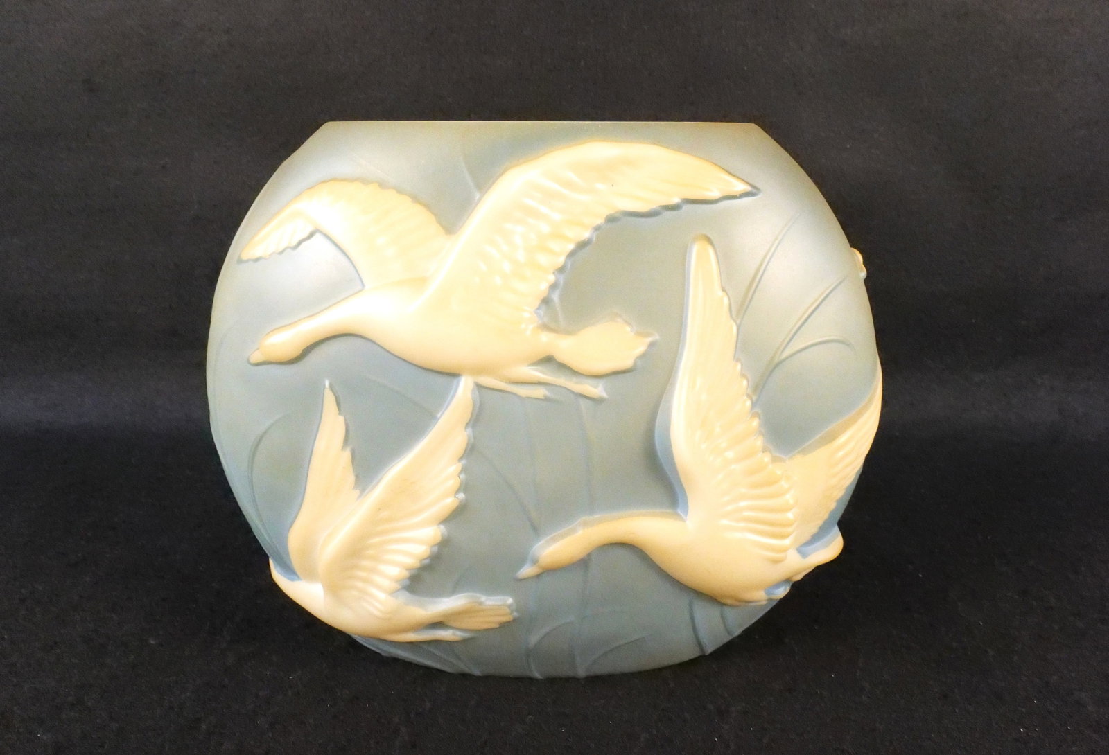 Phoenix Sculptured Art Glass Pillow Vase - Geese Relief: Consolidated/Phoenix Sculptured Art Glass Pillow Vase. Flying Geese High Relief Motif. Measures 9.5" tall x 12" wide. All invoices must be paid within 24 hours of the sale. We offer multiple shipping