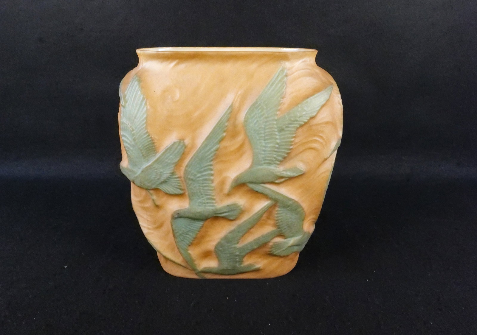 Phoenix Sculptured Art Glass Vase - Flying Geese Relief: Consolidated/Phoenix Sculptured Art Glass Vase. Flying Geese High Relief Motif. Measures 11" tall x 10.5" wide. Has a chip on the side edge. All invoices must be paid within 24 hours of the sale. We o