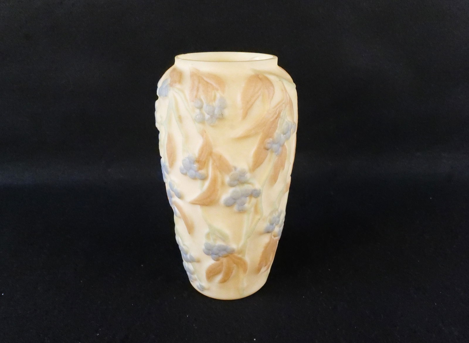 Phoenix Sculptured Art Glass Vase - Bittersweet Relief: Consolidated/Phoenix Sculptured Glass Vase. Bittersweet Pattern in Painted High Relief. Chips on rim. Measures 9.75" tall x 6" wide. All invoices must be paid within 24 hours of the sale. We offer mul