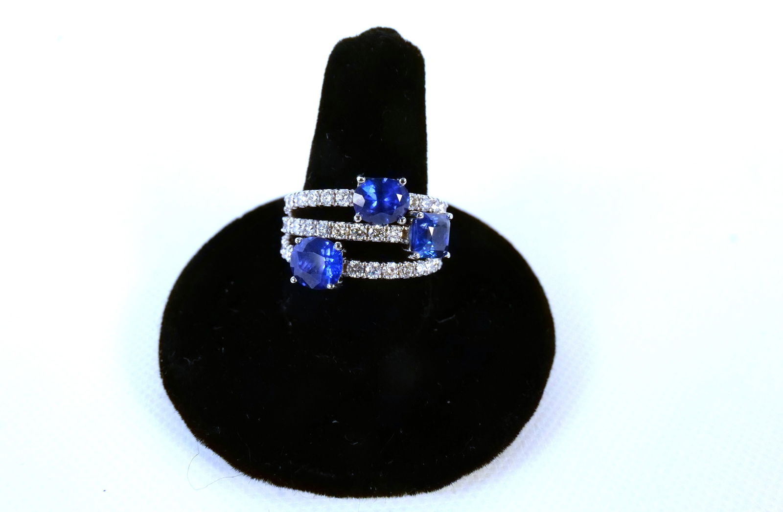 14K White Gold Sapphire and Diamond Ring: 14K White Gold Sapphire and Diamond Ring. Sapphire weight is approx. 3.62 carats. Diamond weight is approx. 1.49 carats. Total weight of the ring is 7.6 grams. Ring Size 7. Comes with a GGA Report. Al