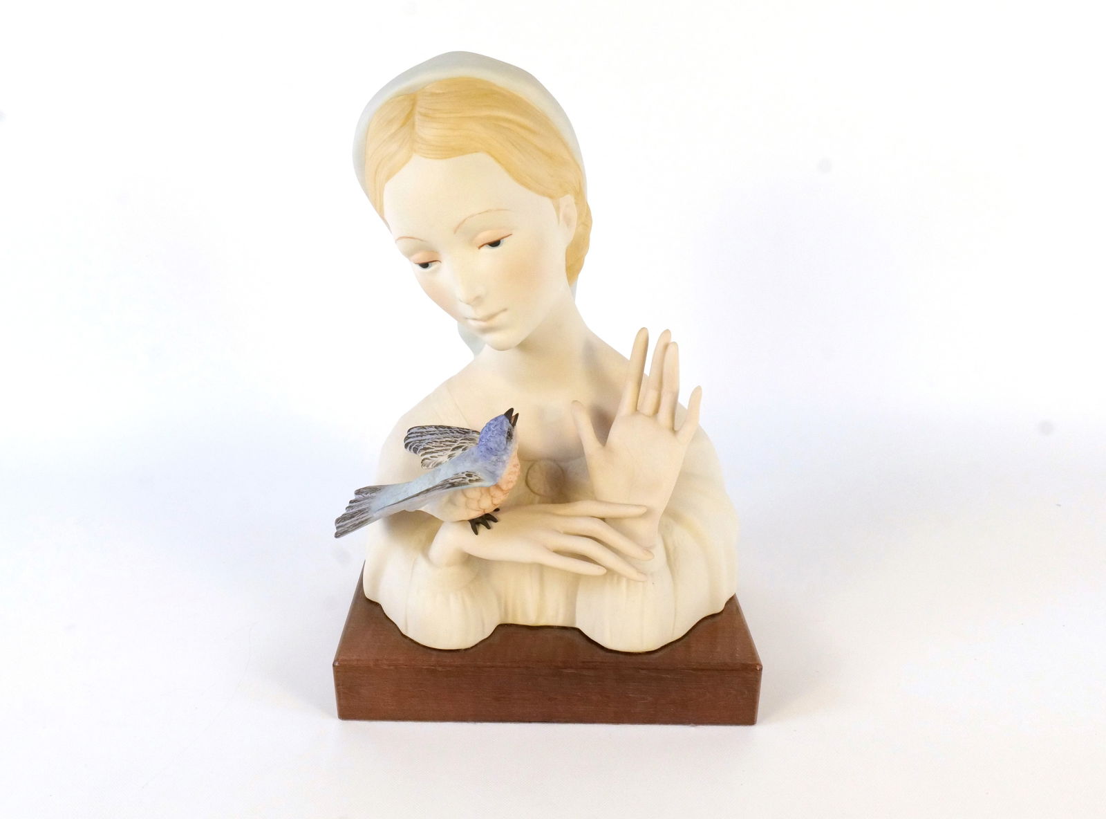 Cybis Madonna with Bird Porcelain Bust: Cybis Madonna with Bird Porcelain Bust. Comes on Wooden Base. Measures 12" tall x 7.75" wide. All invoices must be paid within 24 hours of the sale. We offer multiple shipping options, please read the
