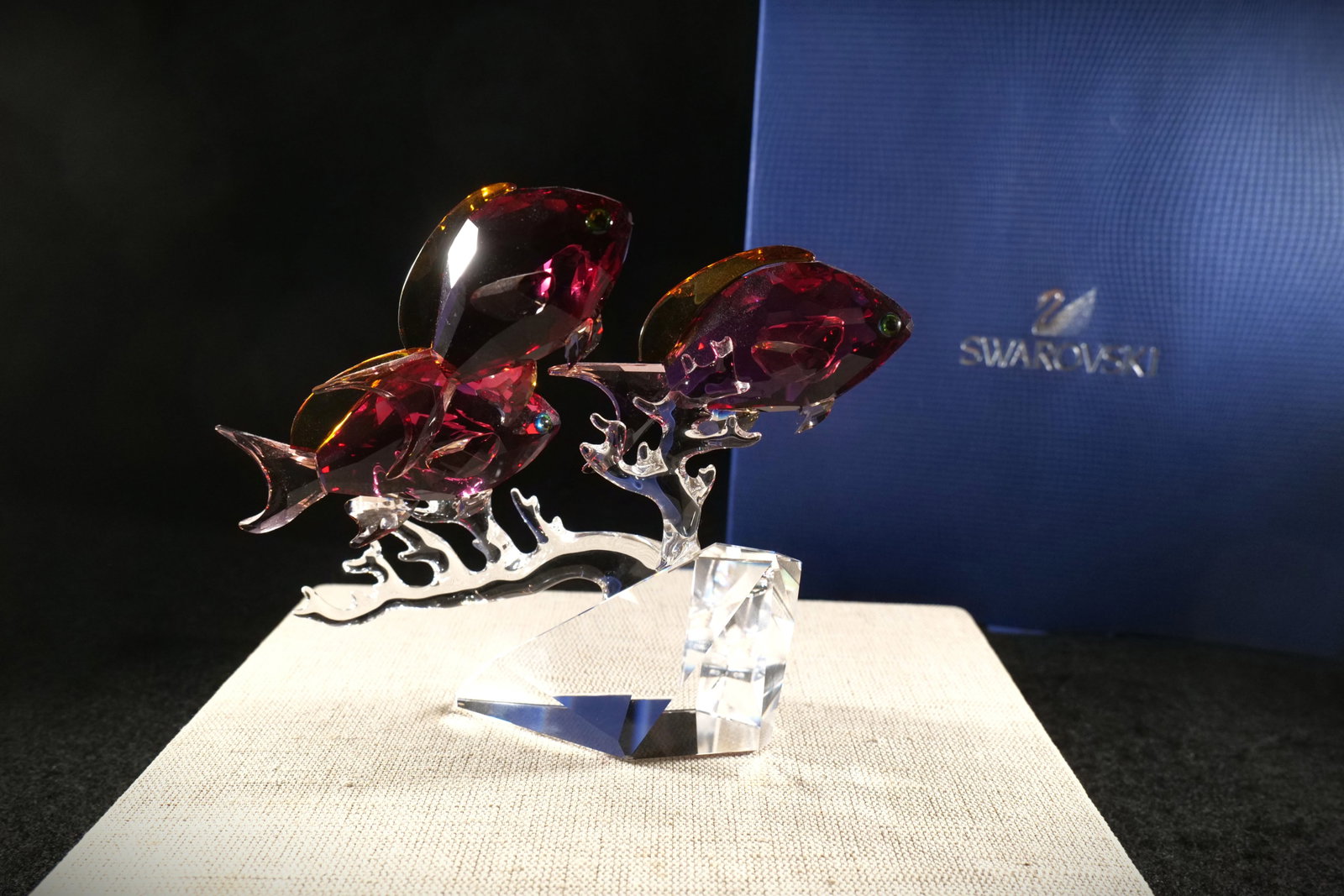 Swarovski Anthias Fish Trio Figurine: Swarovski Anthias Fish Trio Figurine. Fuchsia and amber colored on clear crystal coral. Measures 5.5" tall x 7" wide. Comes with original box. All invoices must be paid within 24 hours of the sale. We