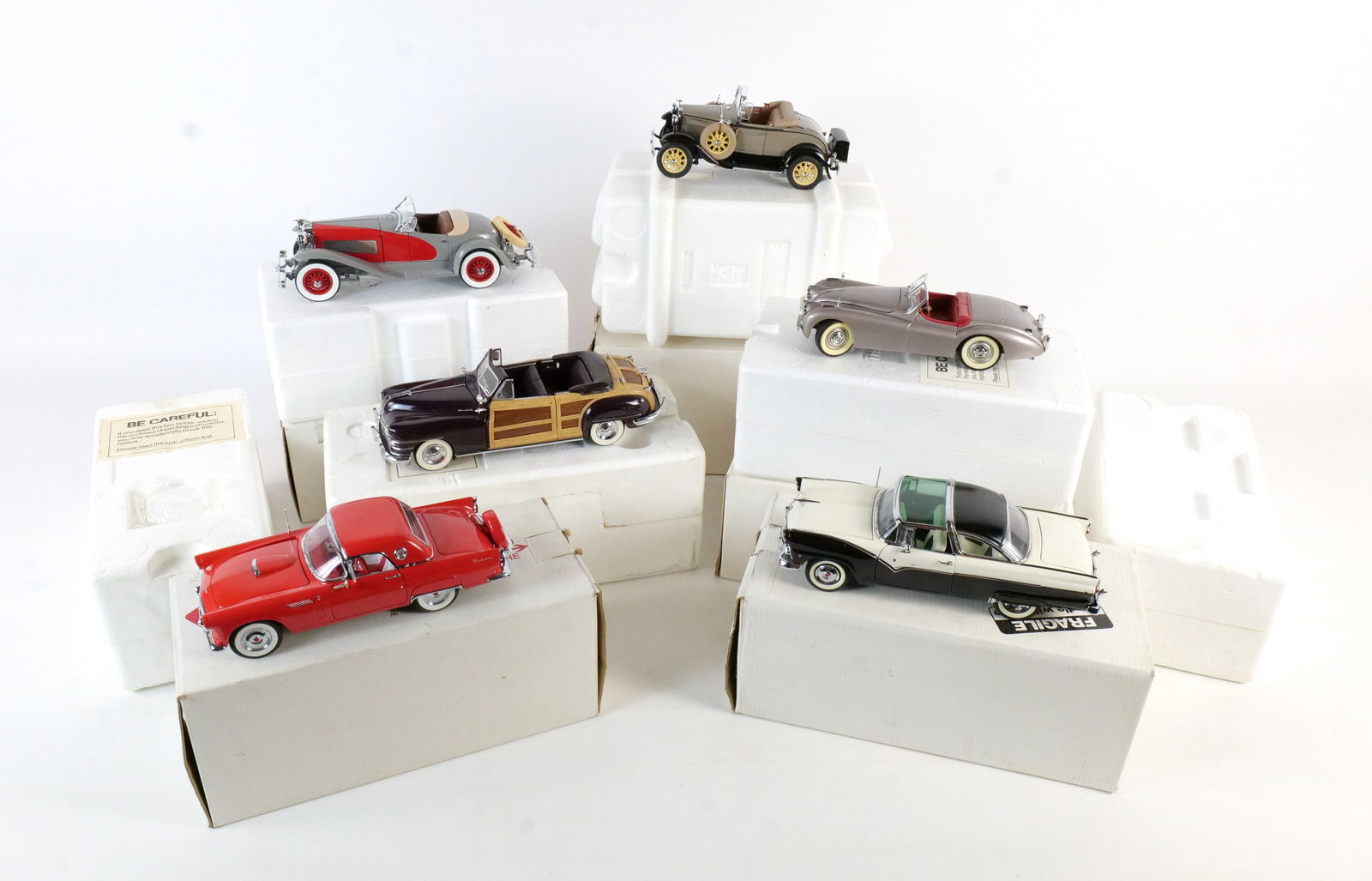 Lot of 6 Danbury Mint Diecast Cars 1:24 Scale: Lot of 6 Danbury Mint Diecast Cars 1:24 Scale. Including 1955 Ford Fairlane Crown Victoria, 1949 Jaguar XK120, 1956 Ford Thunderbird, 1935 Duesenberg, 1931 Ford Model A Roadster, and Crysler 1948 Town