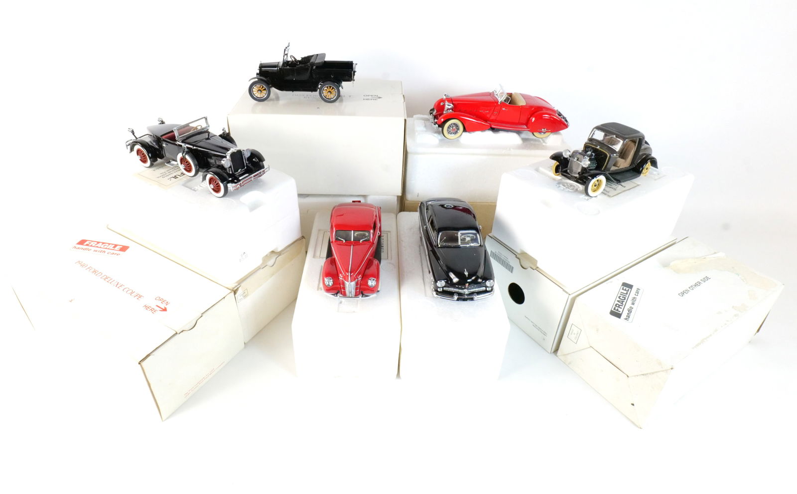 Lot of 6 Danbury Mint Diecast Cars 1:24 Scale: Lot of 6 Danbury Mint Diecast Cars 1:24 Scale. Lot includes A Red 1940 Ford Deluxe Coupe, A Black 1949 Mercury Club Coupe, A Black 1927 Stutz Black Hawk, A Black 1925 Ford Model T Runabout, A Black Li