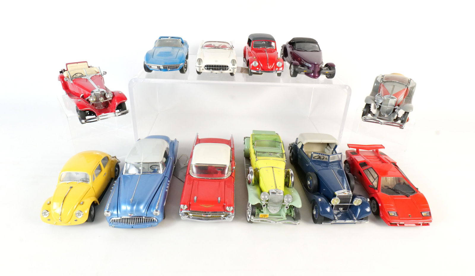 Lot of 12 Assorted Diecast Cars 1:24: Lot of 12 Assorted Diecast Cars 1:24. Lot includes Danbury and Franklin Mont. Lot includes a 1967 Volkswagen Cabriolet, a 1957 Chevrolet Bel Air, a 1949 Buick Riviera, a 1967 Volkswagen Beetle, a Lamb