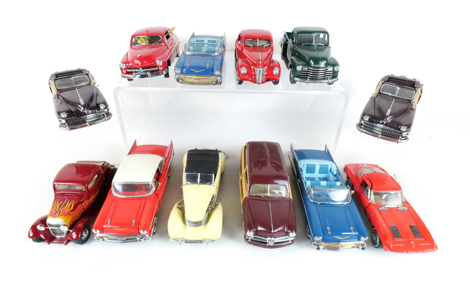 Lot of 12 Assorted Diecast Cars 1:24: Lot of 12 Assorted Diecast Cars 1:24. Franklin and Danbury Mint. Lot includes a 1949 Ford Woody-Wagon, a Red 1963 Corvette, a Red 1969 Mercury Fire Chiefs Car, a Blue 1957 Chevrolet Bel Air. Full Disc
