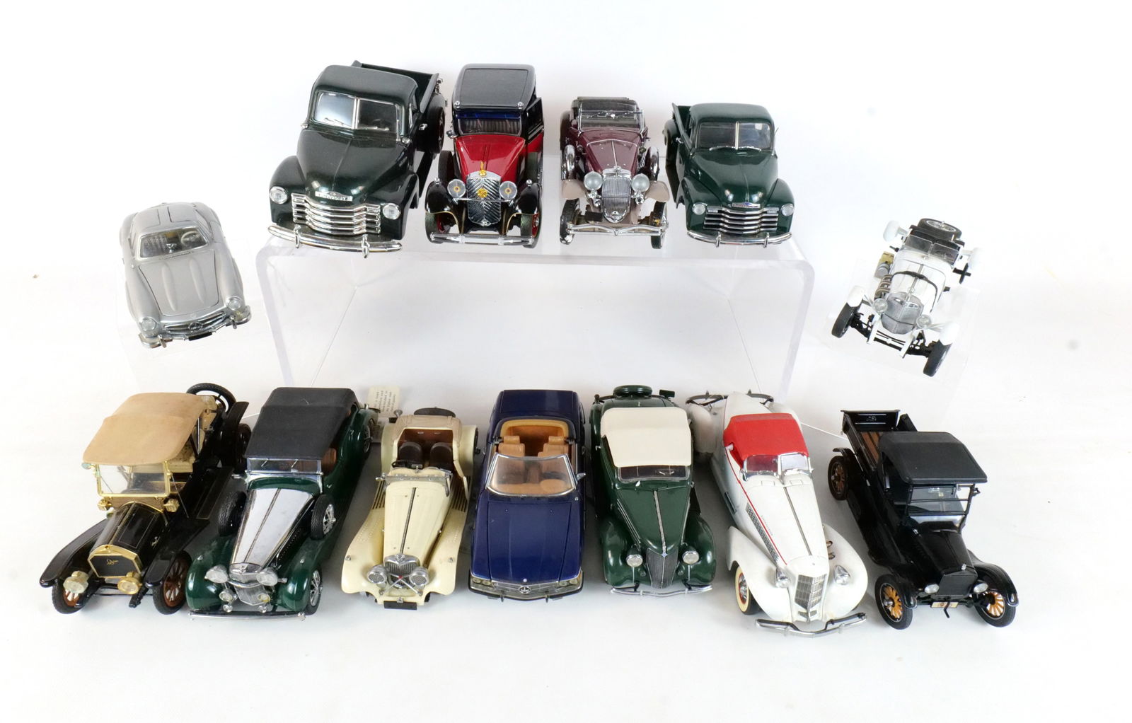 Lot of 12 Assorted Diecast Cars 1:24 Scale: Lot of 12 Assorted Diecast Cars 1:24. Franklin and Danbury Mint. Lot includes a Silver 1954 Mercedes-Benz 300SL, a Blue Mercedes-Benz 450SL, a Burgundy 1930 Duesenberg Derham TourIster, a Red and Blac