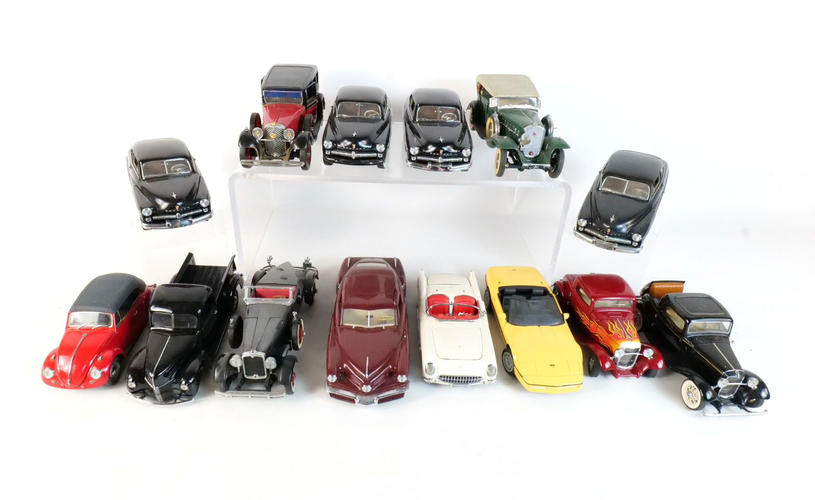 Lot of 12 Assorted Diecast Cars 1:24 Scale: Lot of 12 Assorted Diecast Cars 1:24. Franklin and Danbury Mint. Lot Includes a Yellow 1986 Corvette, a Burgundy 1948 Tucker Tin Goose, a Red and Black 1935 Mercedes-Benz 77K Grosser, a Burgundy with
