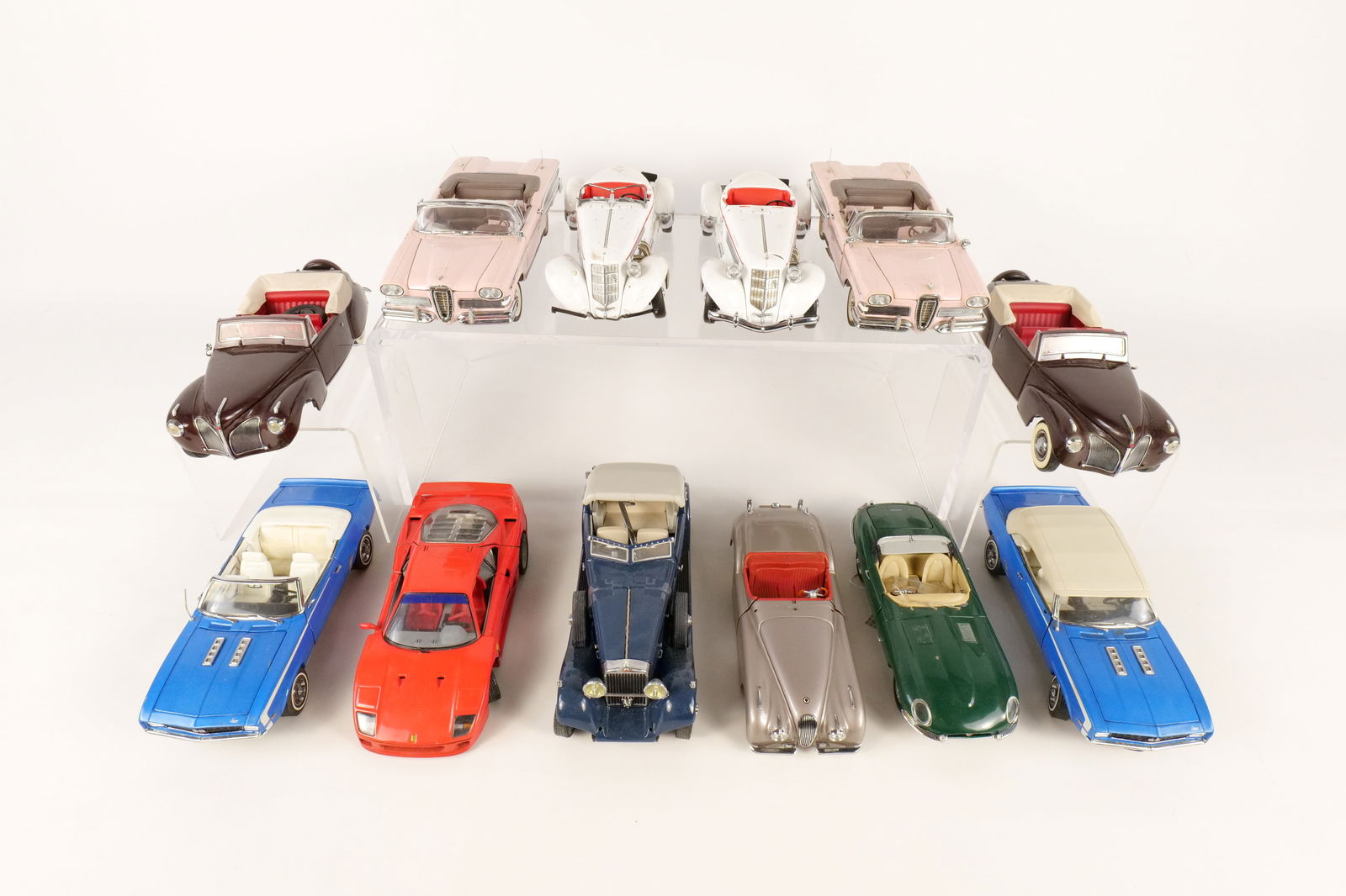 Lot of 12 Assorted 1:24 Scale Diecast Cars: Lot of 12 Assorted 1:24 Scale Diecast Cars. Mostly Franklin and Danbury Mint. Including 1969 Camaro, 1961 Jaguar Type E, 1935 Auburn Boattail, 1959 Cadillac Eldorado Biarritz, and More. Full Disclosur