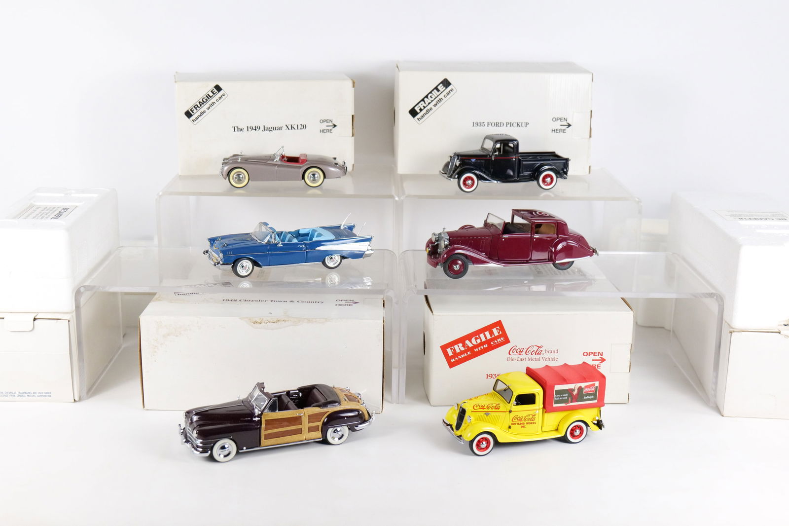 Lot of 6 Danbury Mint 1:24 Scale Diecast Cars: Lot of 6 Danbury Mint 1:24 Scale Diecast Cars. Including 1948 Chrysler Town and Country, 1935 Ford Pickup, 1949 Jaguar XK120, 1935 Coca Cola Delivery Truck, 1938 Rolls Royce Phantom III, and 1957 Chev