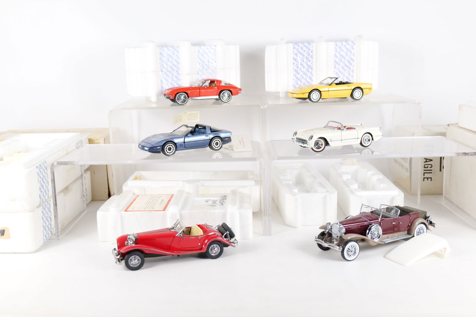 Lot of 6 Franklin Mint 1:24 Scale Diecast Cars: Lot of 6 Franklin Mint 1:24 Scale Diecast Cars. Including 1986 Corvette, 1953 Corvette, Mercedes 500K Special Roadster, 1930 Deusenberg. 1963 Corvette, and 1984 Corvette. Full Disclosure - Most Cars i