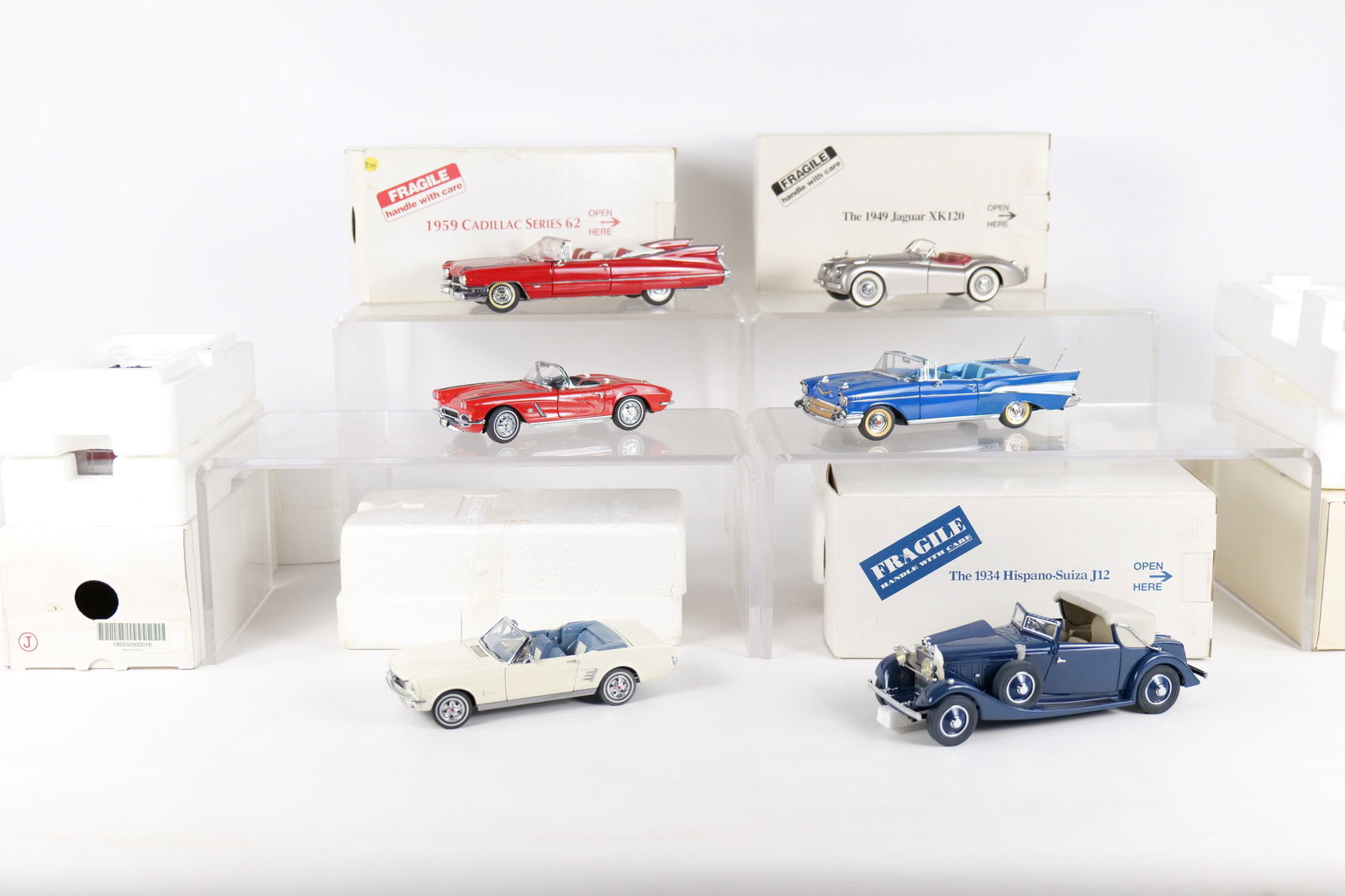 Lot of 6 Danbury Mint 1:24 Scale Diecast Cars: Lot of 6 Danbury Mint 1:24 Scale Diecast Cars. Including 1957 Chevrolet Bel Air, 1962 Chevrolet Corvette, 1949 Jaguar XK120, 1966 Ford Mustang, 1934 Hispano-Suiza J12, and 1959 Cadillac Series. Full D