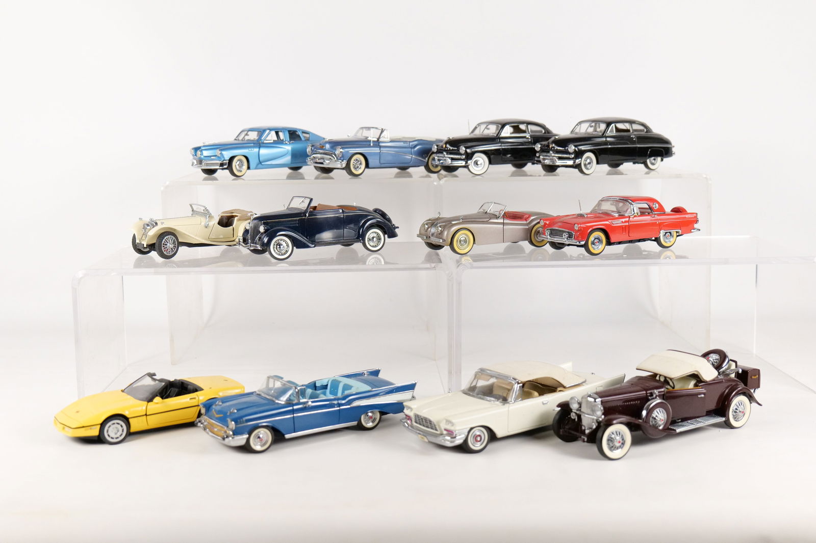 Lot of 12 Assorted 1:24 Scale Diecast Cars: Lot of 12 Assorted 1:24 Scale Diecast Cars. Mostly Franklin and Danbury Mint. Including 1948 Tucker, 1953 Buick Skylark, 1949 Mercury Coupe, 1985 Corvette, 1949 Jaguar XK120 and More. Full Disclosure