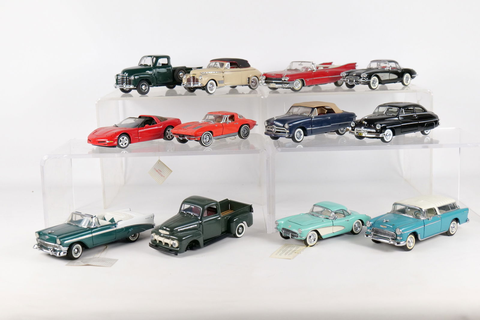 Lot of 12 Assorted 1:24 Scale Diecast Cars: Lot of 12 Assorted 1:24 Scale Diecast Cars. Mostly Franklin and Danbury Mint. Including 1963 Corvette, 1949 Mercury Coupe, 1949 Ford Convertible, 1997 Corvette, 1951 Ford F-1 Pickup, and More. Full Di