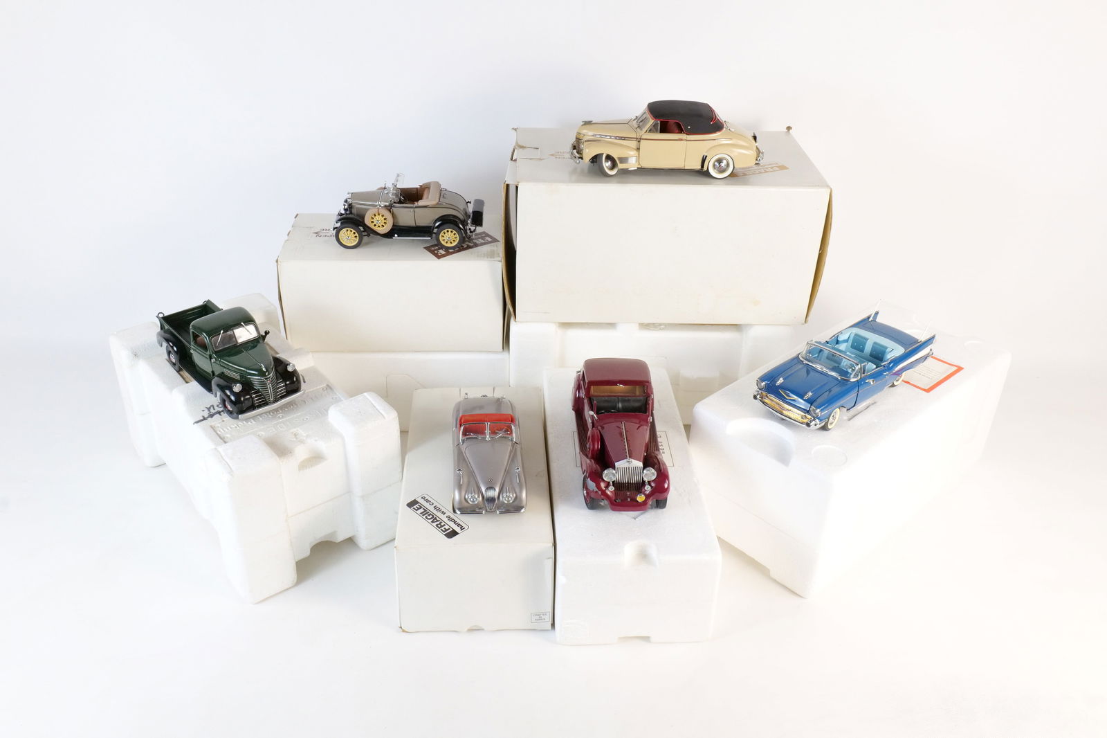Lot of 6 Danbury Mint 1:24 Scale Diecast Cars: Lot of 6 Danbury Mint 1:24 Scale Diecast Cars. Including 1949 Jaguar XK120, 1941 Plymouth Pickup, 1957 Chevy Bel Air, 1931 Ford Model A Roadster, 1941 Chevy Special Deluxe, and 1938 Rolls Royce Phanto