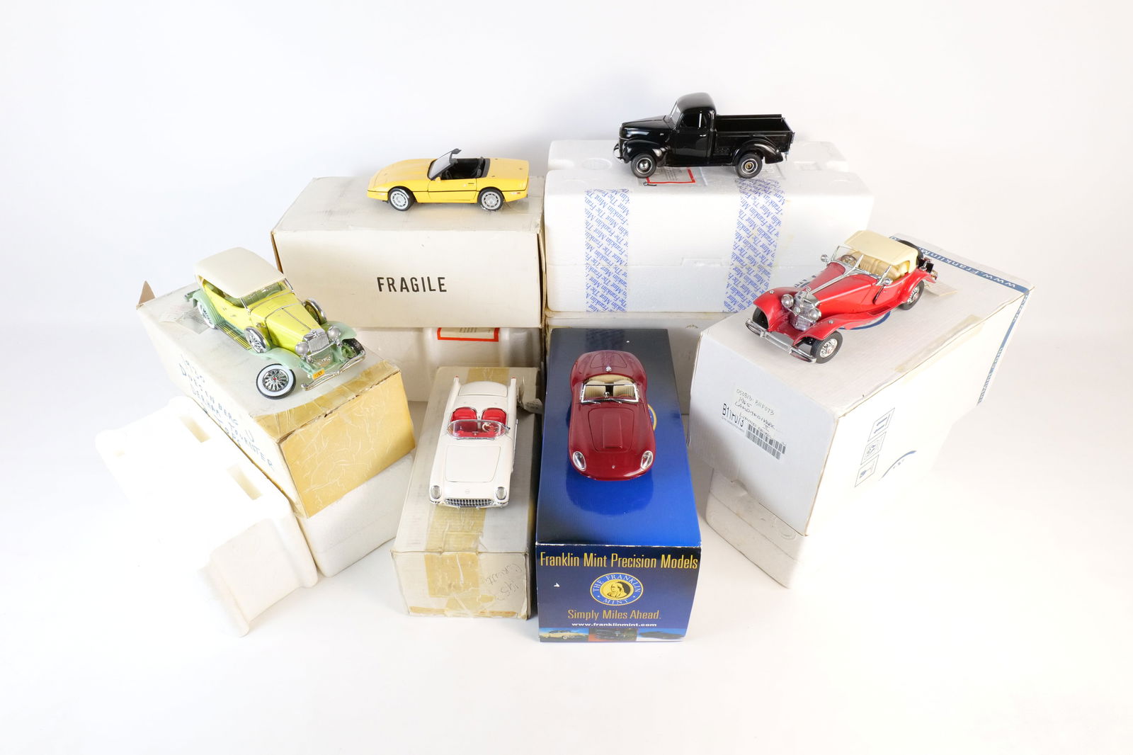 Lot of 6 Franklin Mint 1:24 Scale Diecast Cars: Lot of 6 Franklin Mint 1:24 Scale Diecast Cars. Including 1986 Corvette, Mercedes 500K Special Roadster, 1988 Corvette, 1965 Lambandi Mark III, 1940 Ford Pickup, 1930 Duesenberg, and 1953 Corvette. Fu