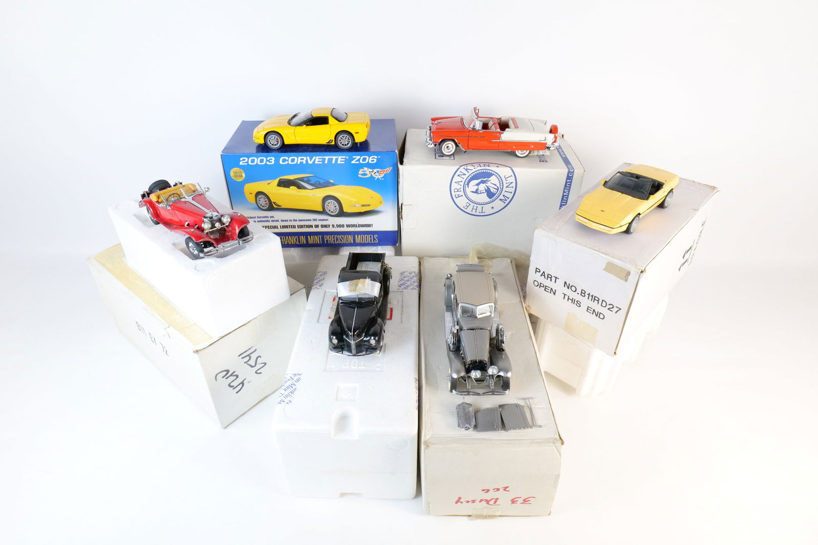 Lot of 6 Danbury Mint 1:24 Scale Diecast Cars: Lot of 6 Franklin Mint 1:24 Scale Diecast Cars. Including 1986 Corvette, Mercedes 500K Special Roadster, 2003 Corvette Z06, 1933 Deusenberg SJ, 1940 Ford Pickup, and 1955 Chevrolet Bel Air. Full Discl