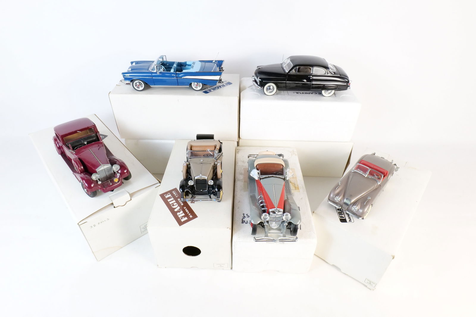 Lot of 6 Danbury Mint 1:24 Scale Diecast Cars: Lot of 6 Danbury Mint 1:24 Scale Diecast Cars. Including 1935 Duesenberg SSJ, 1949 Jaguar XK120, 1949 Mercury Club Coupe, 1938 Rolls Royce Phantom III, 1931 Ford Model A Roadster, and 1957 Chevrolet B