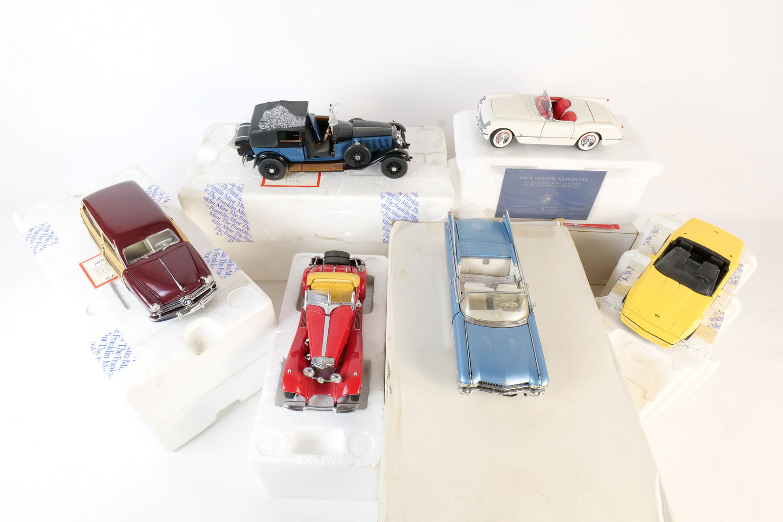 Lot of 6 Franklin Mint 1:24 Scale Diecast Cars: Lot of 6 Franklin Mint 1:24 Scale Diecast Cars. Including 1953 Corvette, 1986 Corvette, 1929 Rolls Royce Phantom , 1949 Ford Woody Wagon, 1935 Mercedes 500K Roadster, and 1959 Cadillac Eldorado Birazz