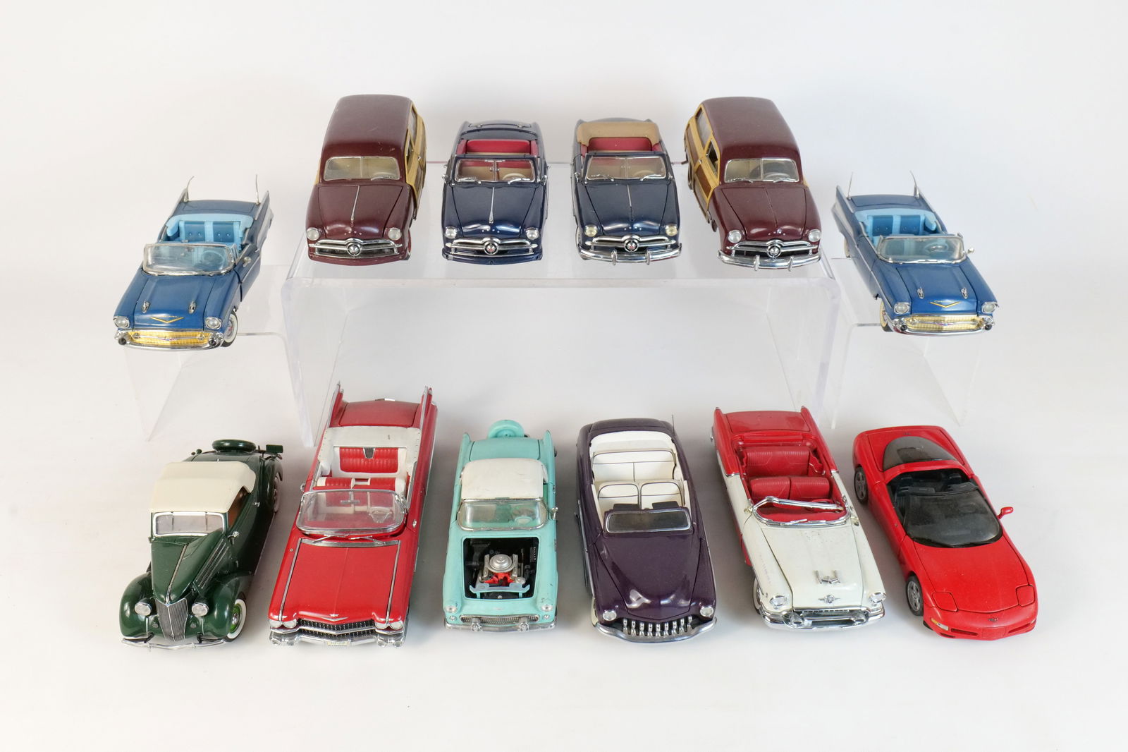 Lot of 12 Assorted 1:24 Scale Diecast Cars: Lot of 12 Assorted 1:24 Scale Diecast Cars. Mostly Franklin and Danbury Mint. Including 1959 Cadillac Series 62, 1957 Chevy Bel Air, 1949 Ford Woody Wagon, 1949 Ford Convertible, 1997 Corvette, and Mo