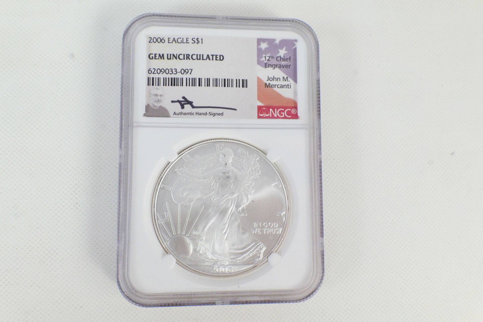 US 2004 $1 Silver Eagle Gem Uncirculated: 2004 $1 .999 fine Silver Eagle Gem Uncirculated. KM-273. Reverse design by John M. Mercanti. Obverse design by Adolph A. Weinman. Walking Liberty / Heraldic Eagle. NGC serial number 6209033-097.