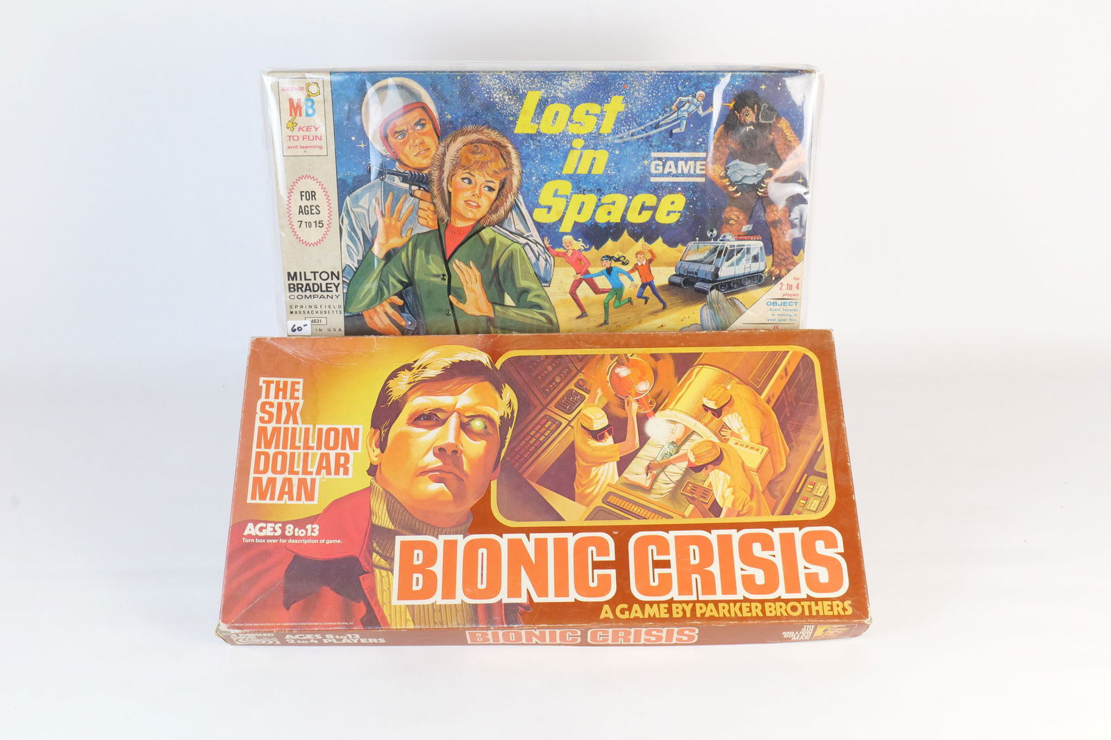 Lot of 2 Vintage Board Games: Lot of 2 Vintage Board Games. Including Lost in Space and Bionic Crisis - Six Million Dollar Man Game. Please see photos for included pieces. All invoices must be paid within 24 hours of the sale. We