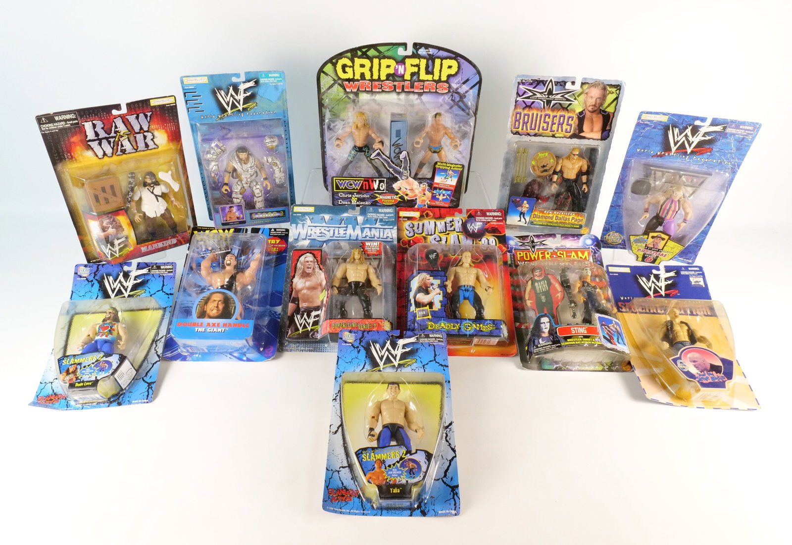 Lot of Wrestling Action Figures: Lot of Wrestling Action Figures. Including WWF Special Edition - Stone Cold Steve Austin, Bruisers - Diamond Dallas, WCW NWO - The Giant, Raw is War - Mankind, Power Slam - Sting, and More. All in pac