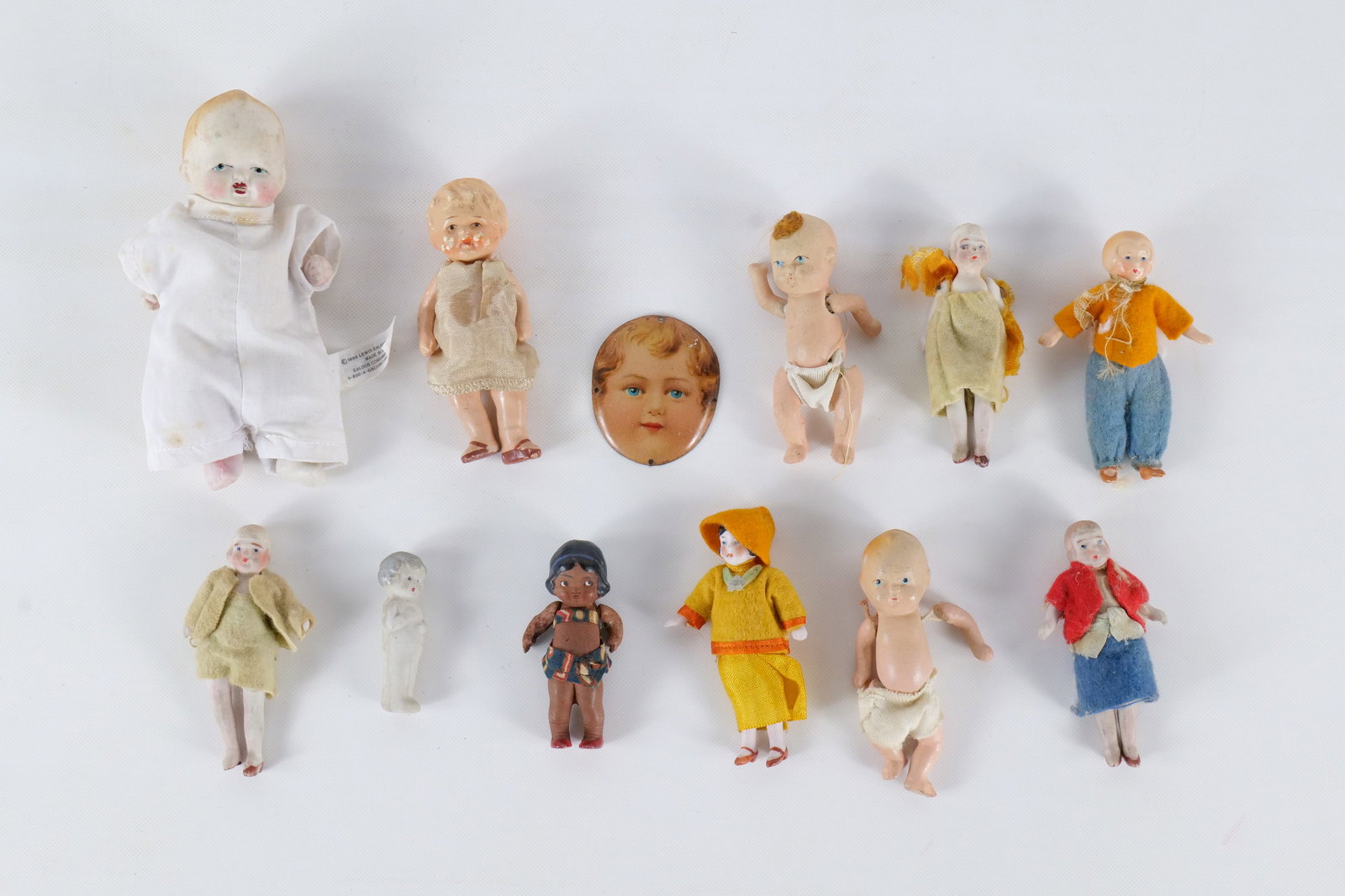 Lot of Antique and Vintage Miniature Bisque Dolls: Lot of Antique and Vintage Miniature Bisque Dolls. Mostly Japan and Germany. Longest measures 5.5". All invoices must be paid within 24 hours of the sale. We offer multiple shipping options, please re