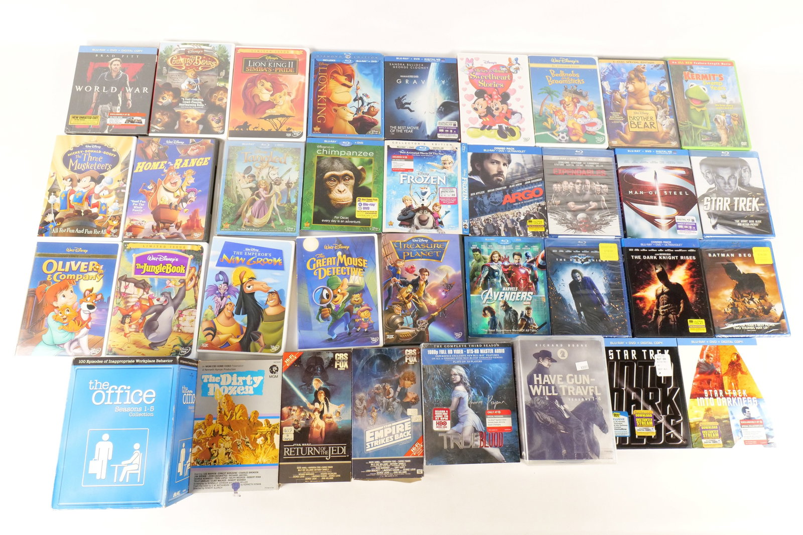 Lot of Mixed DVD's, Blu-Ray's, and VHS: Lot of Mixed DVD's, Blu-Ray's, and VHS. Including The Office Season 1-5 Box Set, Star Wars VHS, True Blood Season 3, Have Gun-Will Travel Season 1-4 Box Set, Various Disney Movie DVD's, and a Selectio